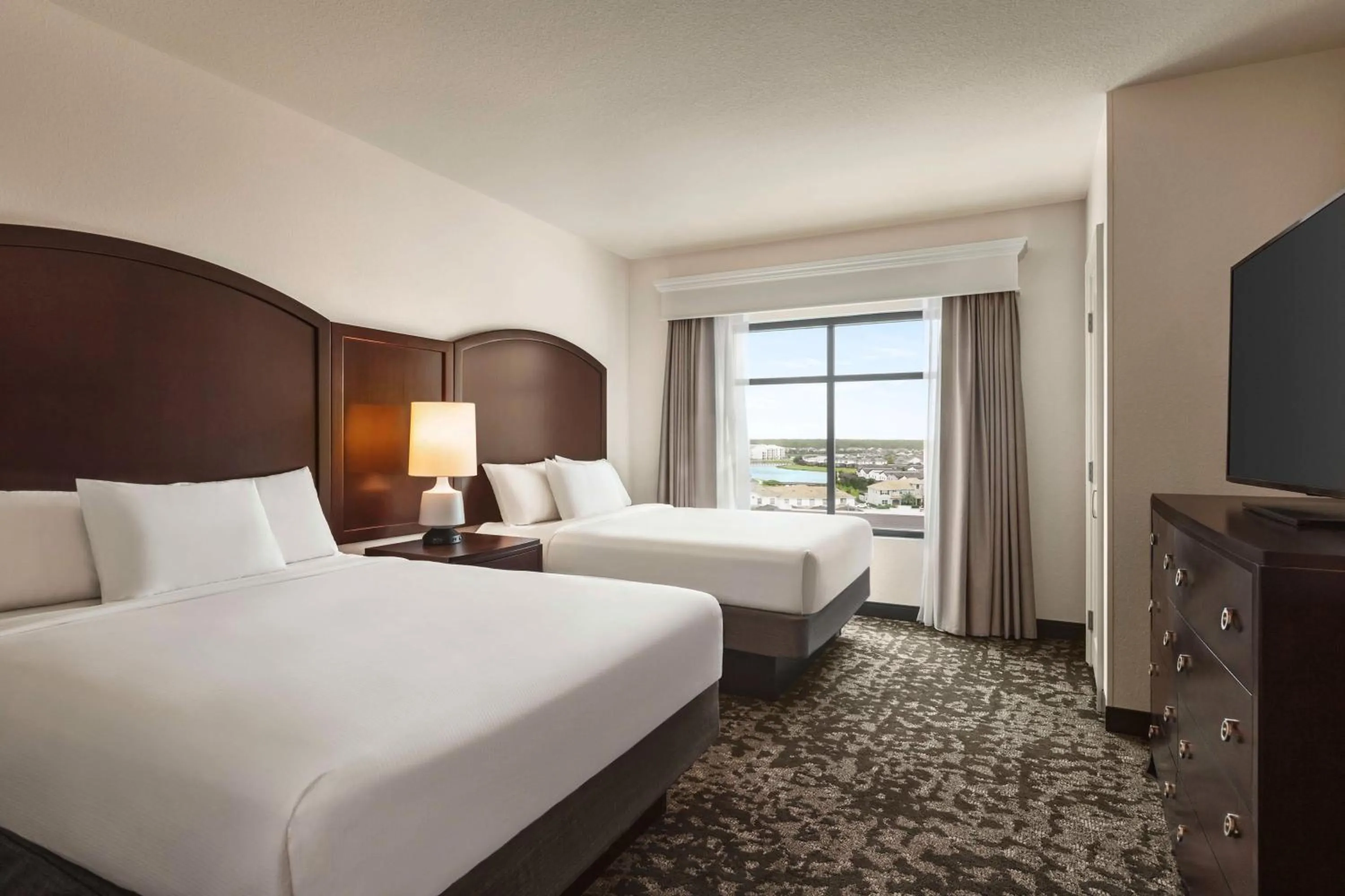 Bed in Embassy Suites by Hilton Orlando Lake Buena Vista South