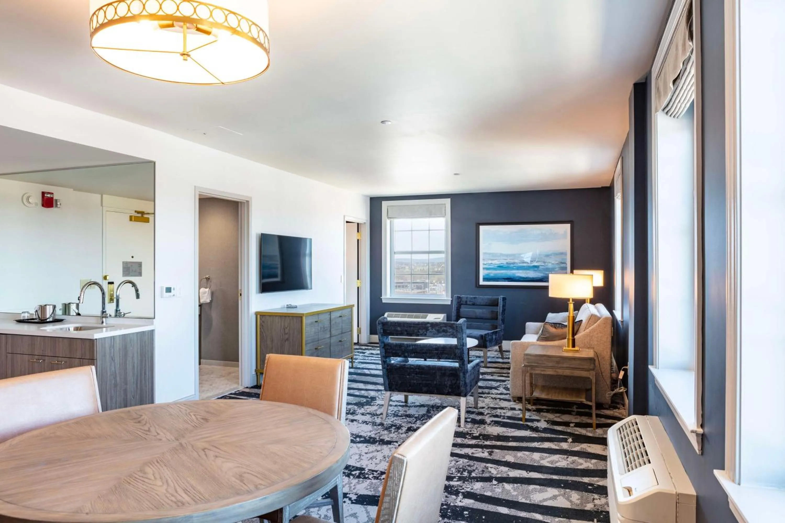 Living room in The Yorktowne Hotel, Tapestry Collection by Hilton