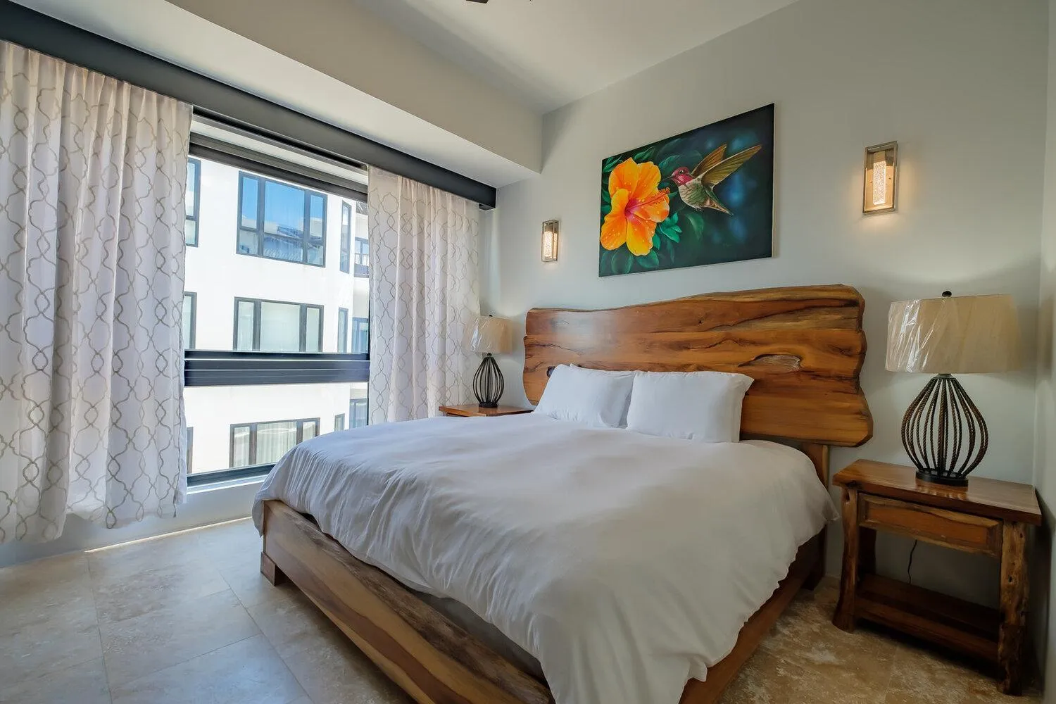 Bed in Diamante Beachfront Suites