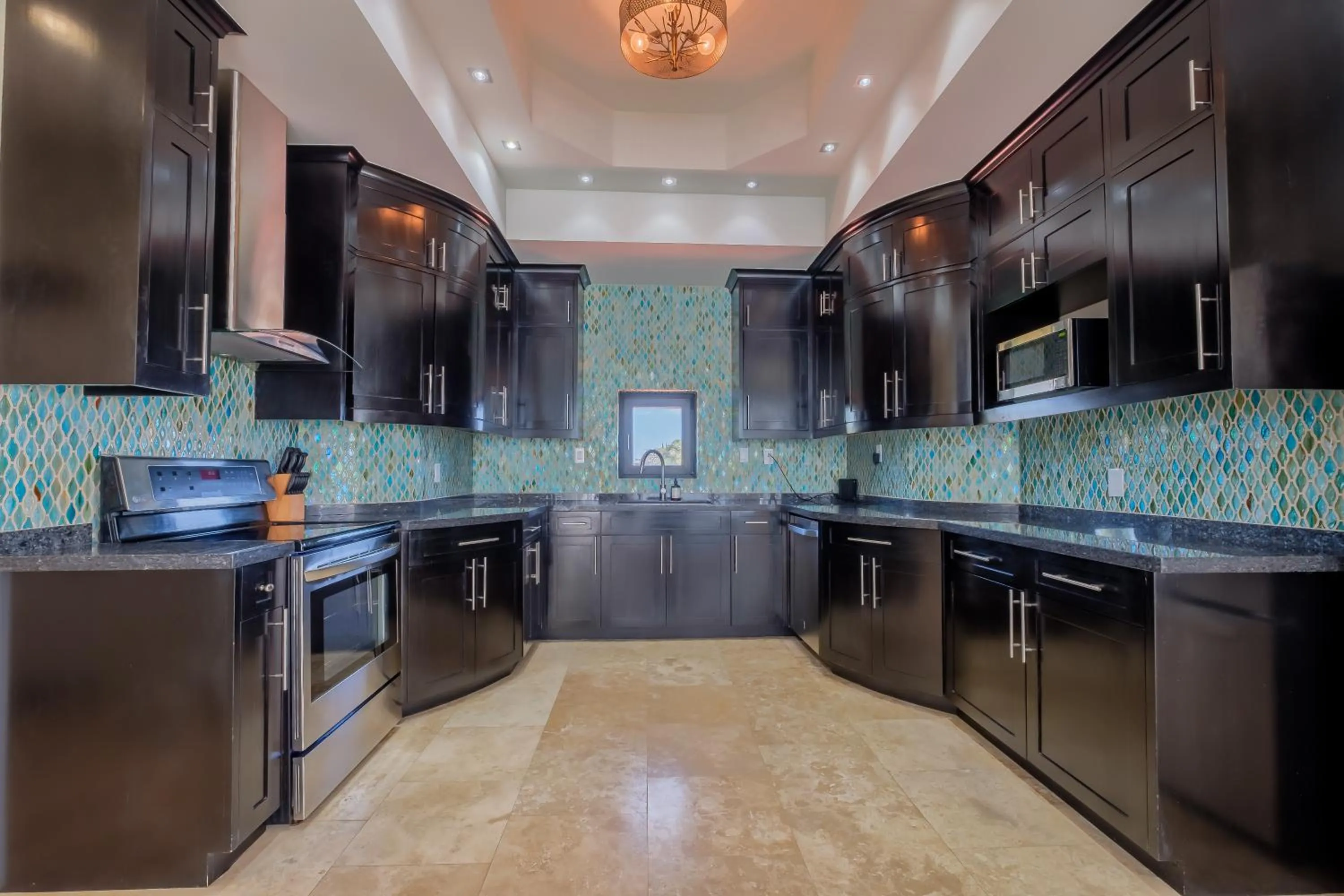 Kitchen or kitchenette in Diamante Beachfront Suites