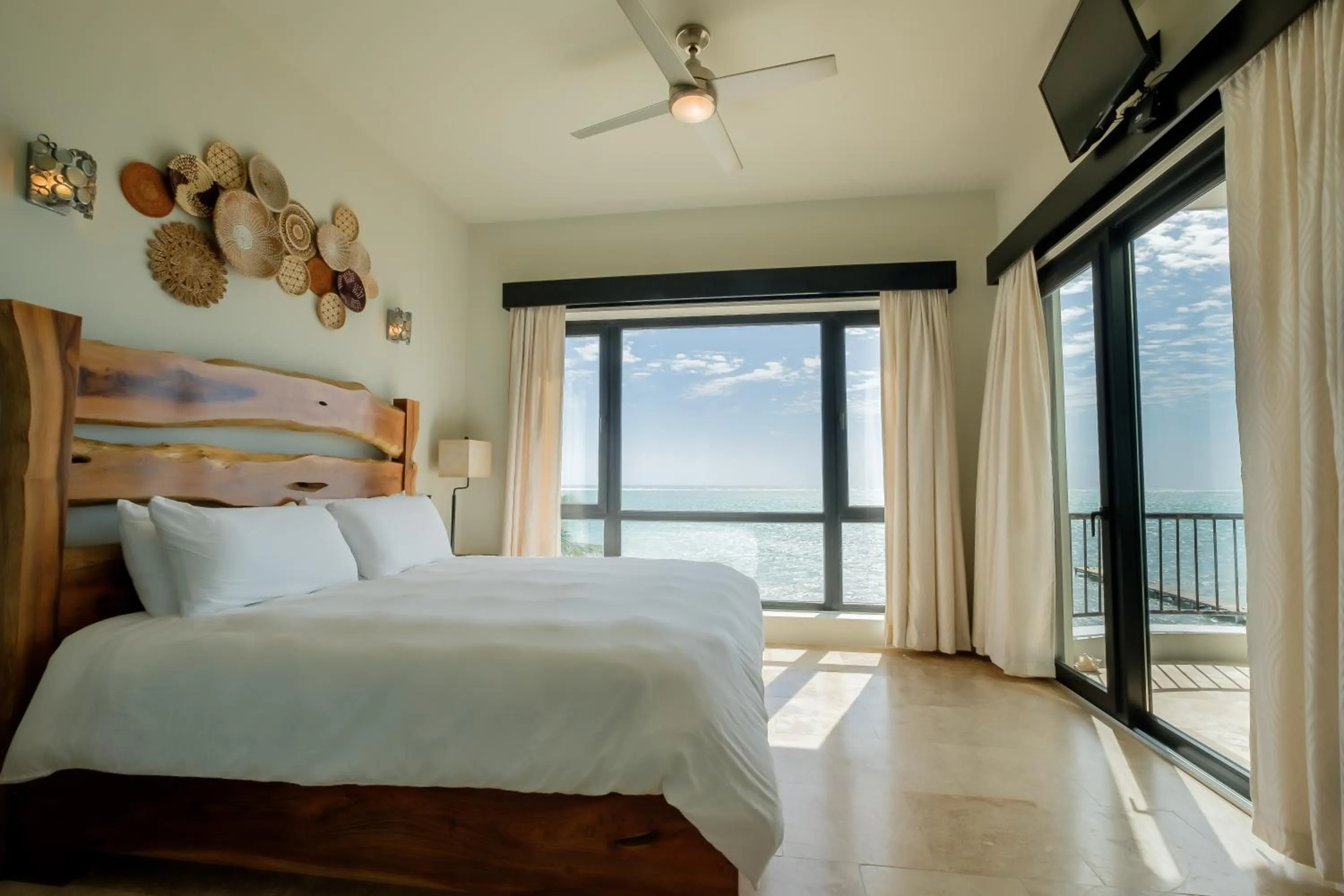 Bed in Diamante Beachfront Suites