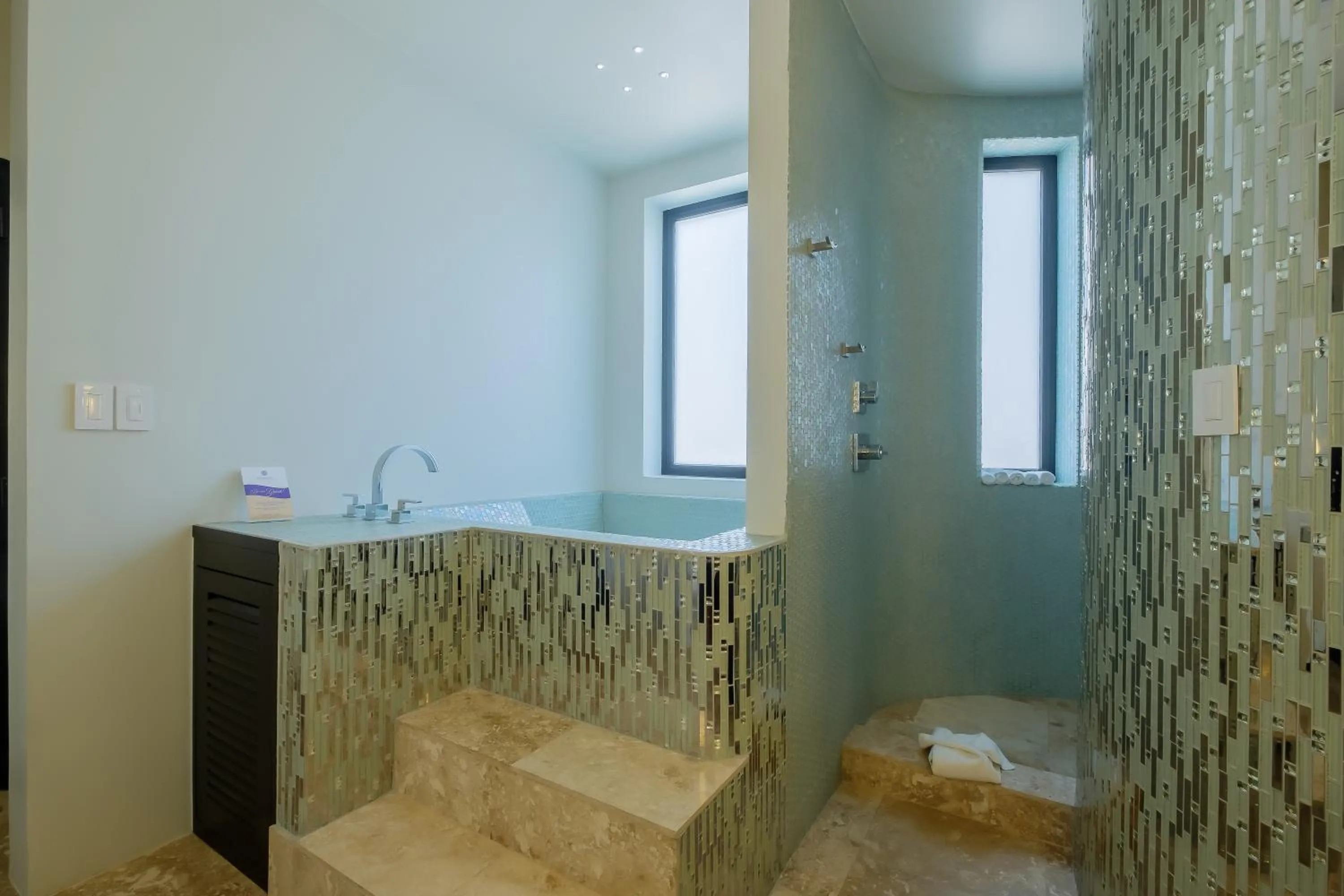 Bathroom in Diamante Beachfront Suites