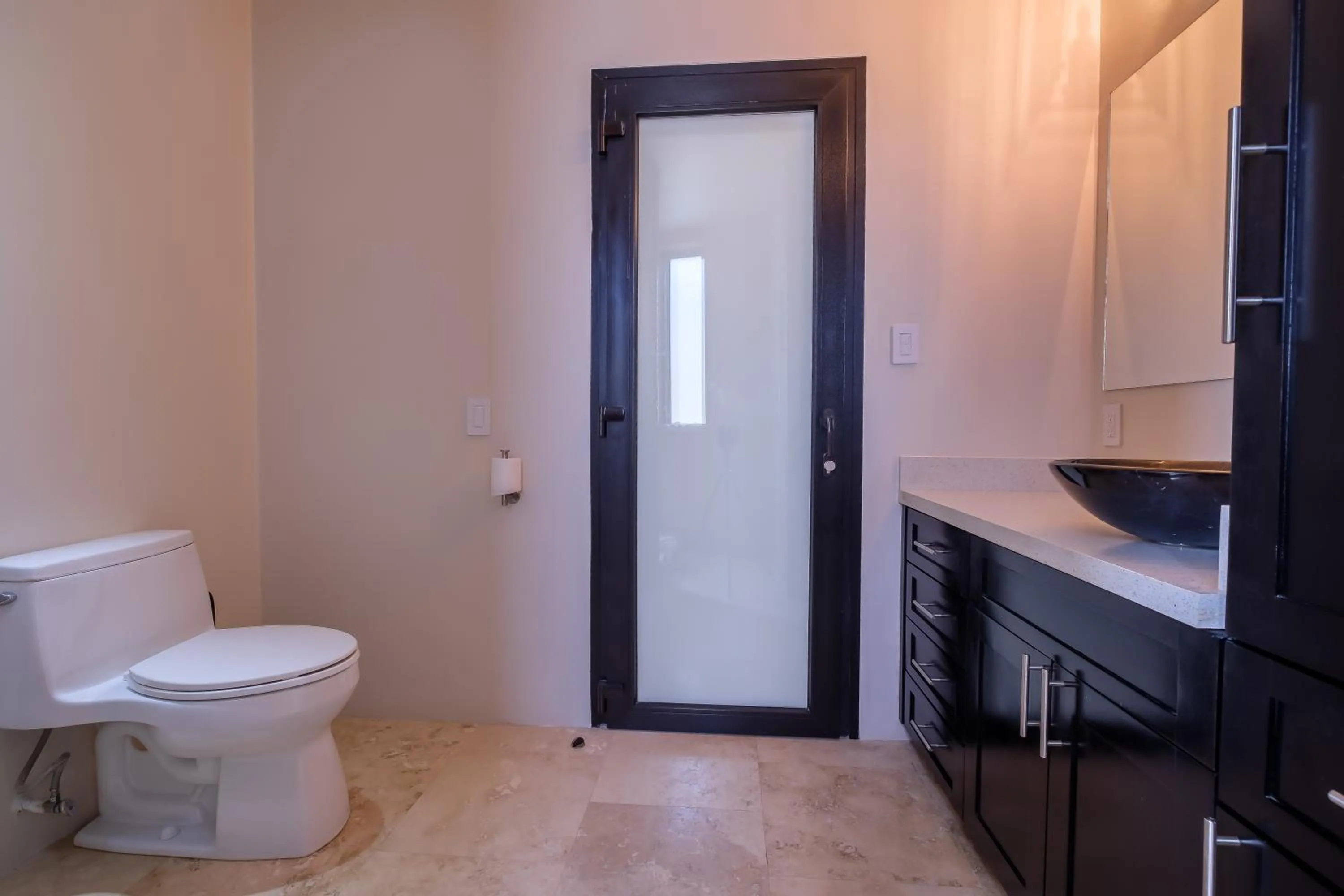 Toilet in Diamante Beachfront Suites