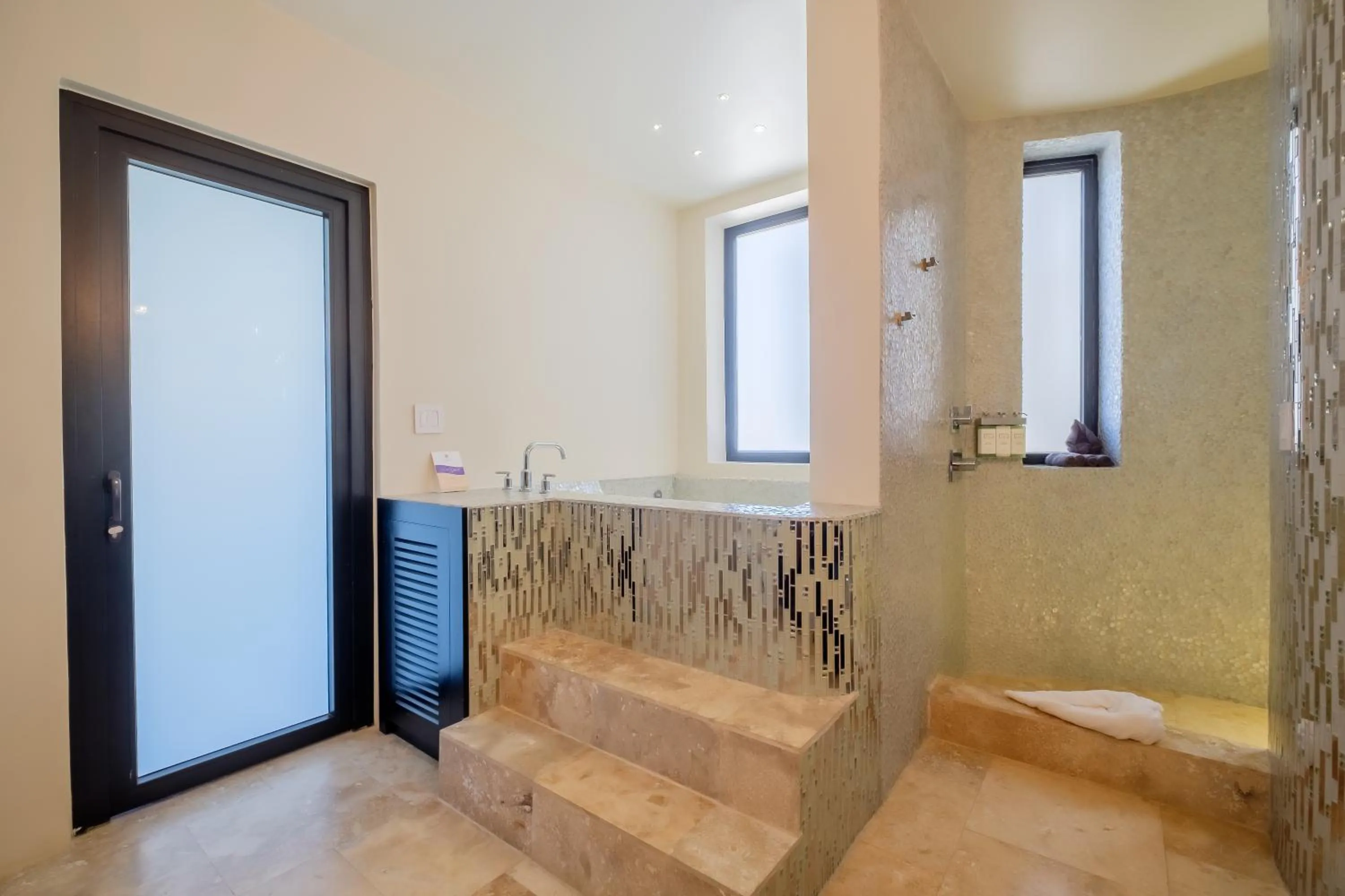 Bathroom in Diamante Beachfront Suites
