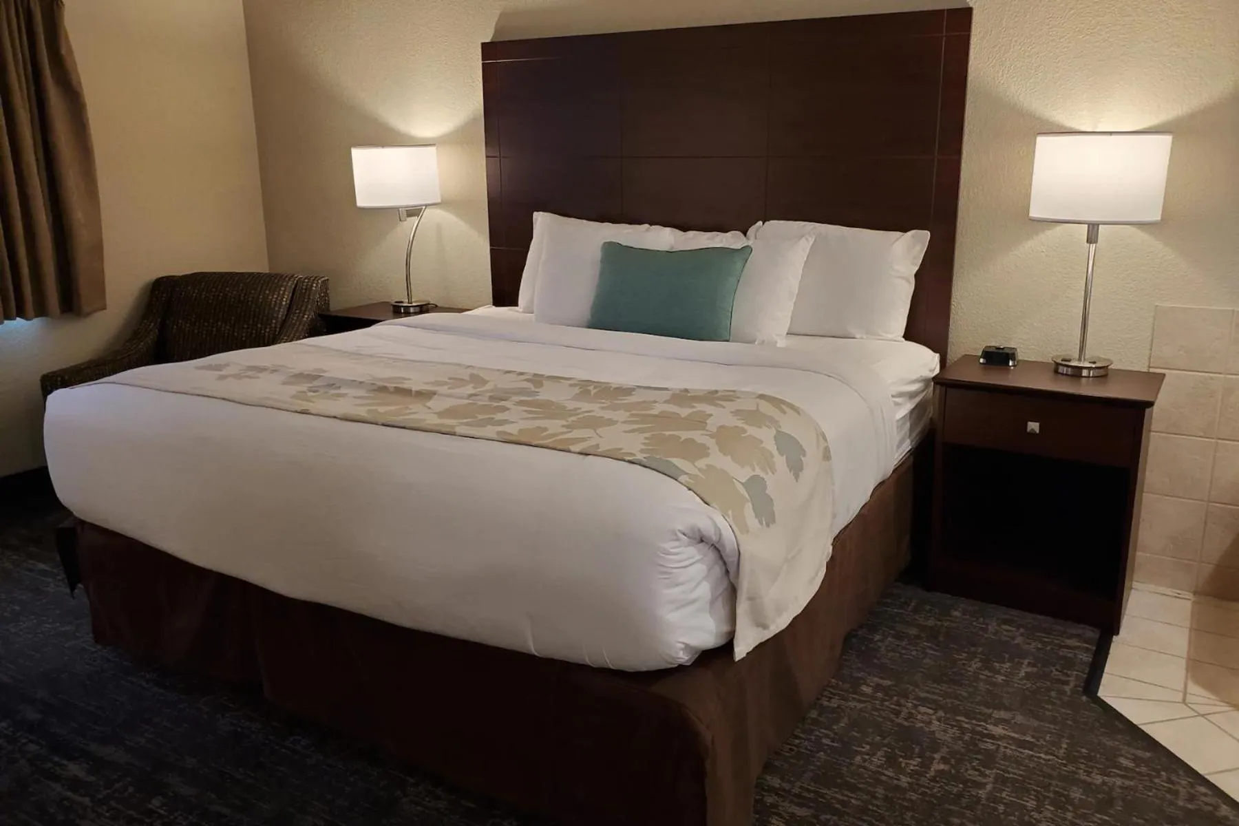 Bed in Cobblestone Suites - Oshkosh