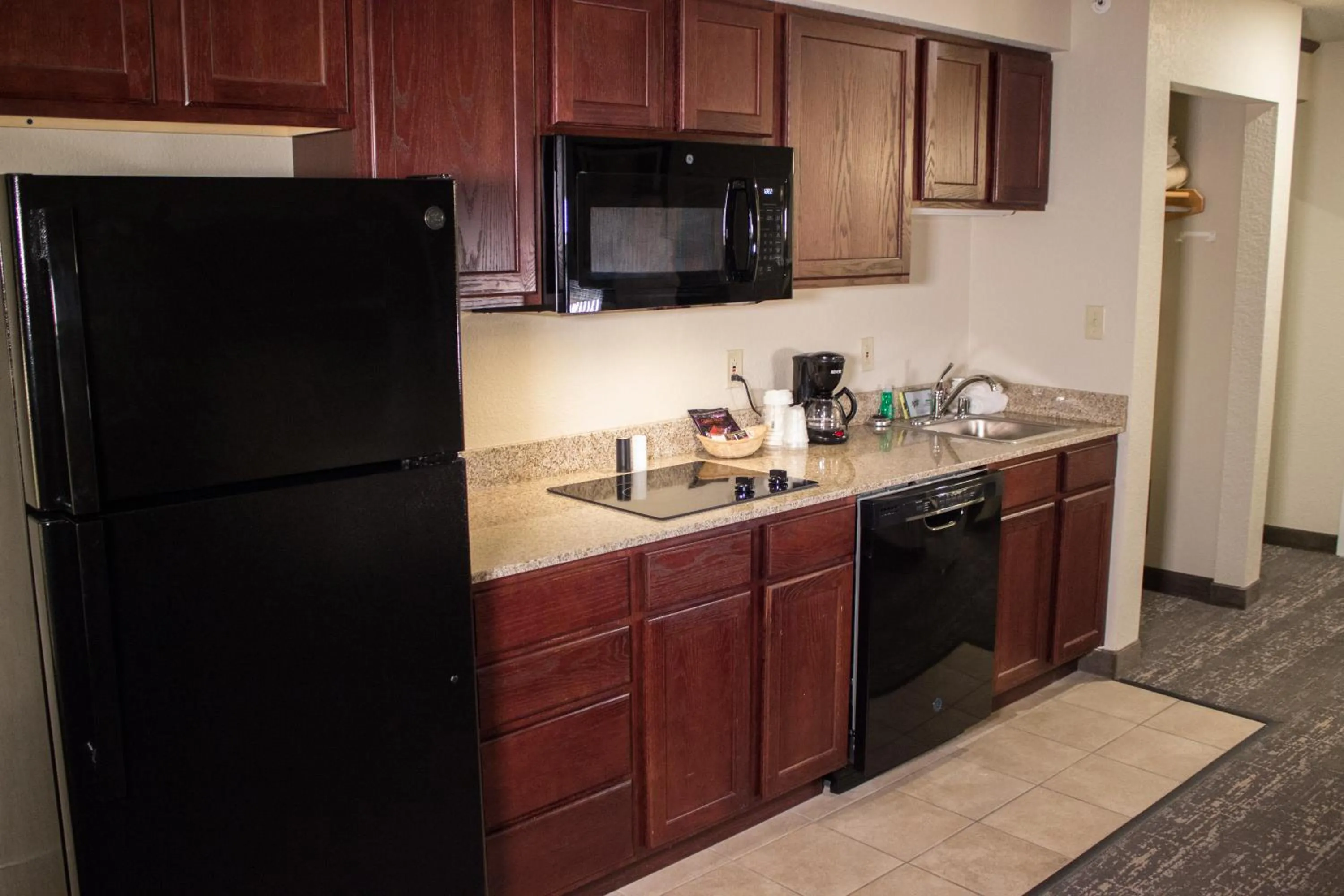 Kitchen or kitchenette in Cobblestone Suites - Oshkosh