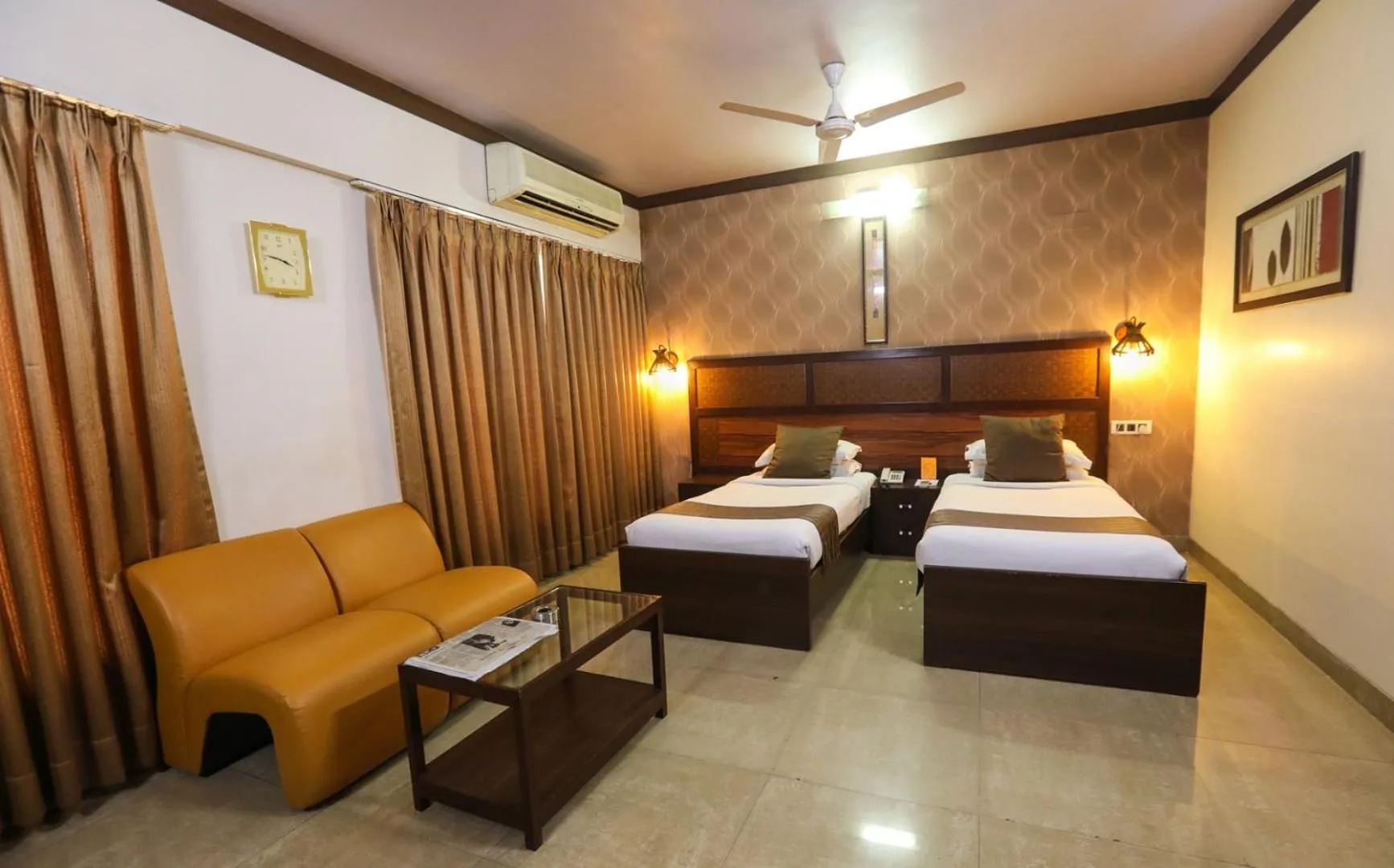 Bed in Jyoti Dwelling Hotel