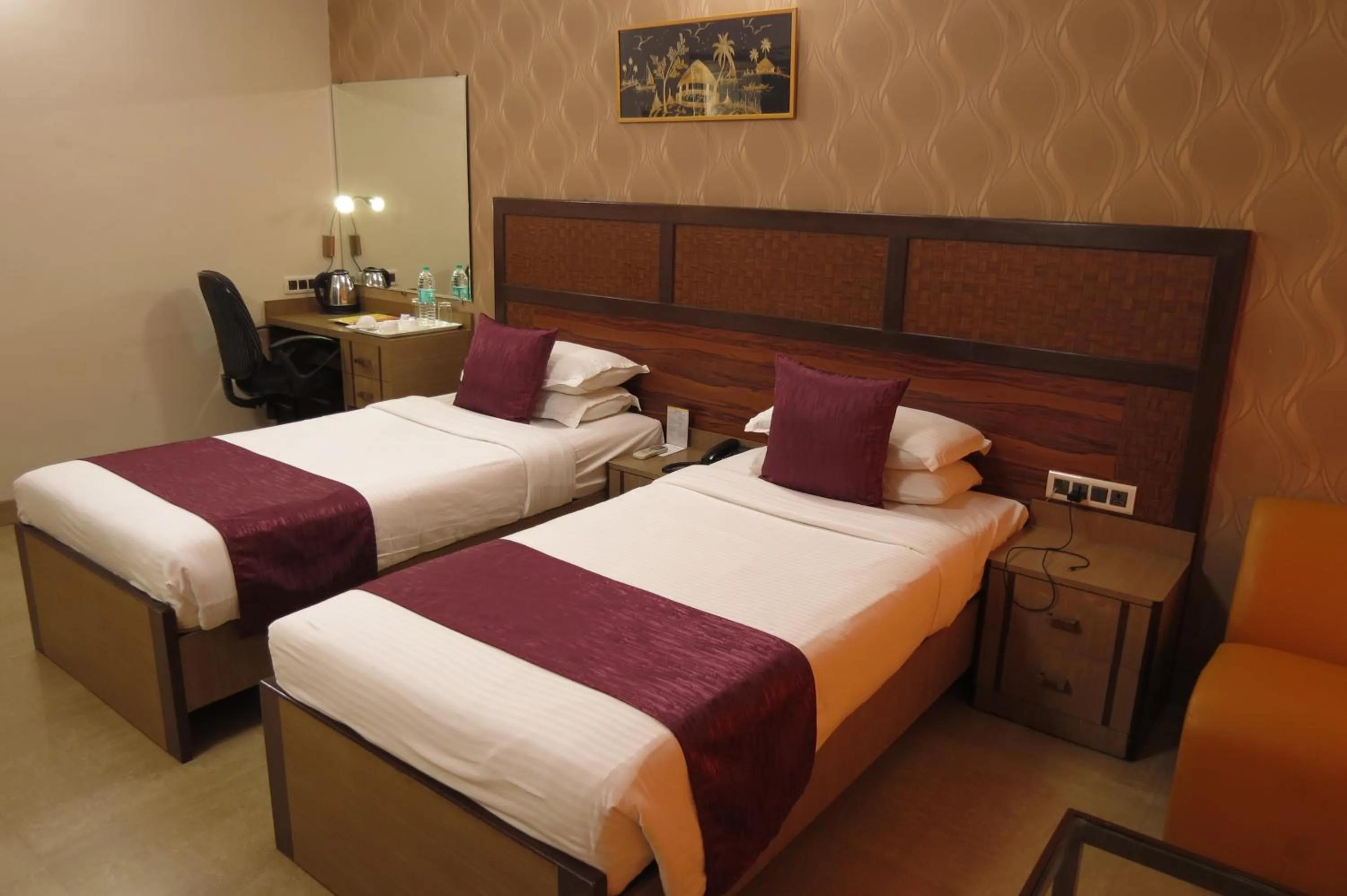 Bed in Jyoti Dwelling Hotel