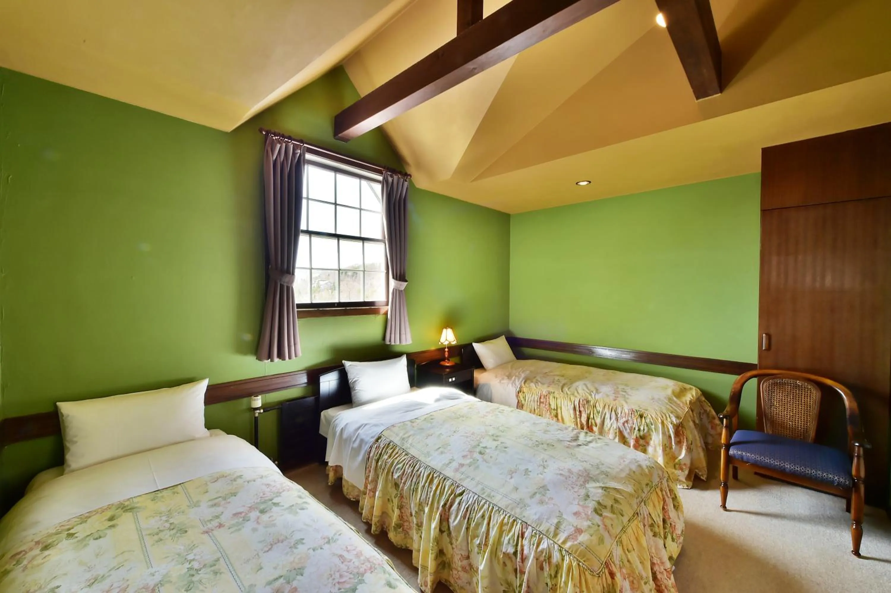 Bedroom, Bed in Petit Hotel Kanan