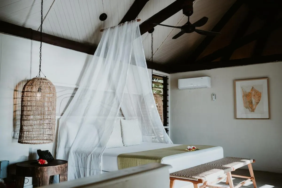 Bed in Yasawa Island Resort & Spa