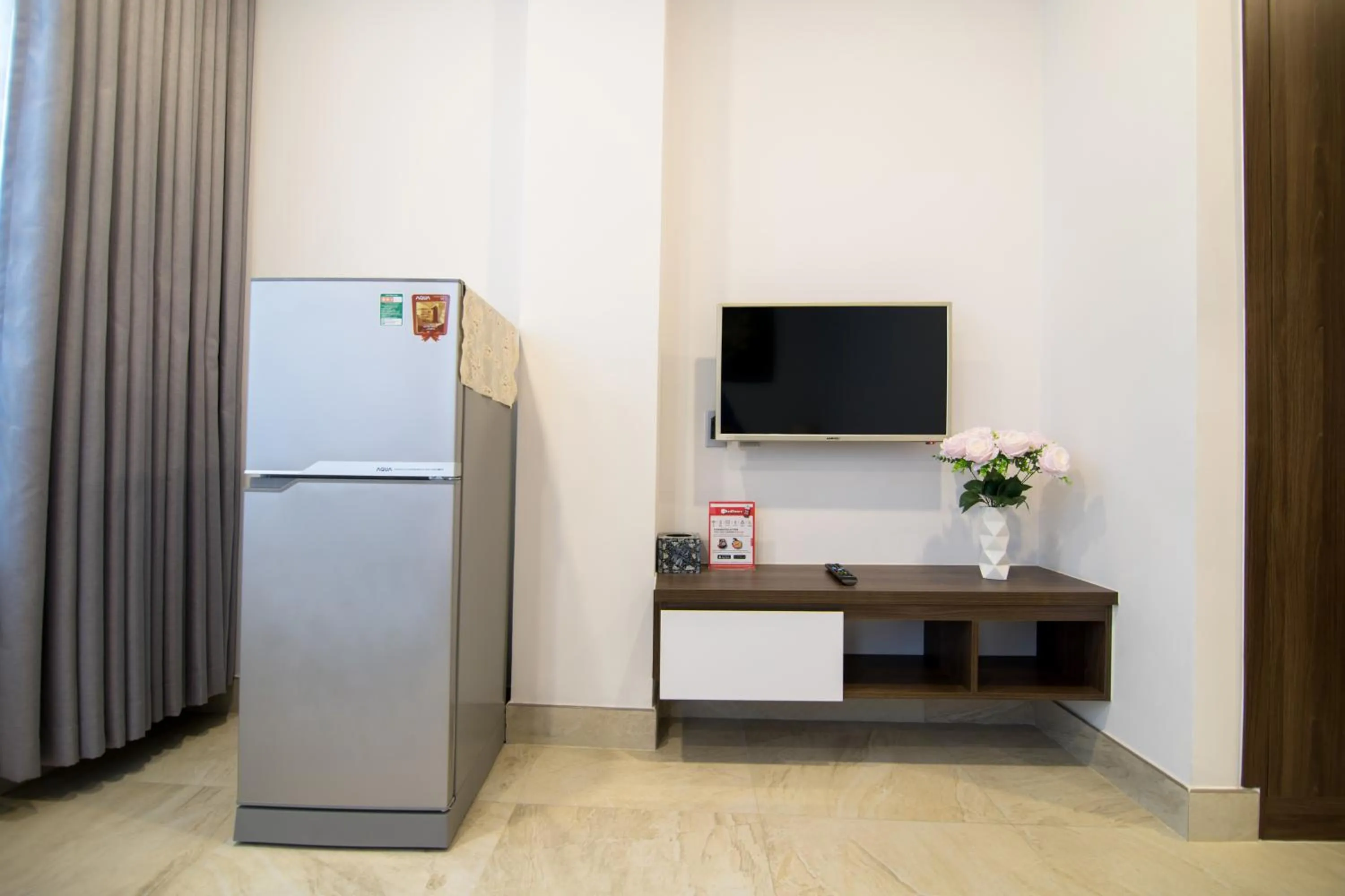 TV and multimedia in AHA Residence Hotel