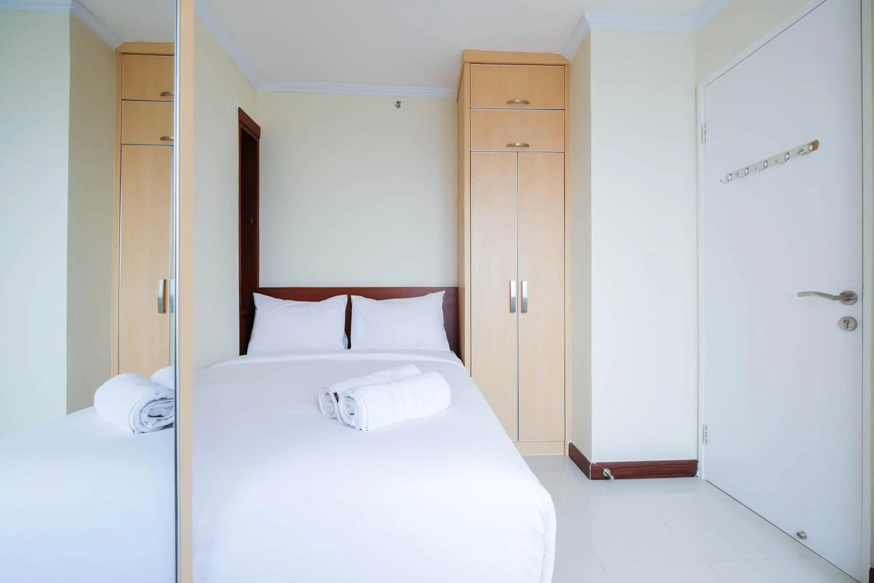 Bed in Cozy 2BR Bassura City Apartment By Travelio Bed in Cozy 2BR Bassura City Apartment By Travelio