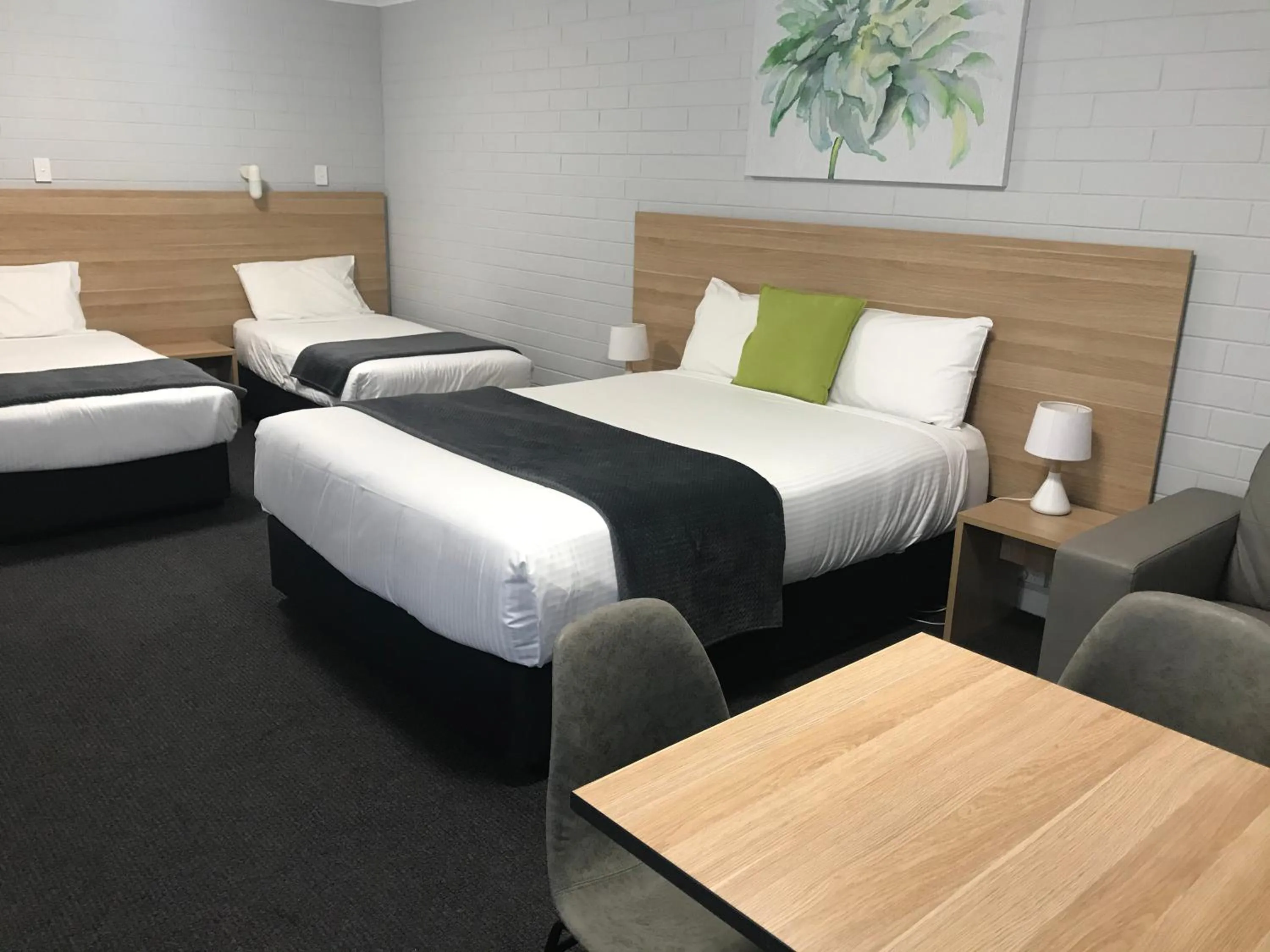 Seating area, Bed in Frewville Motor Inn