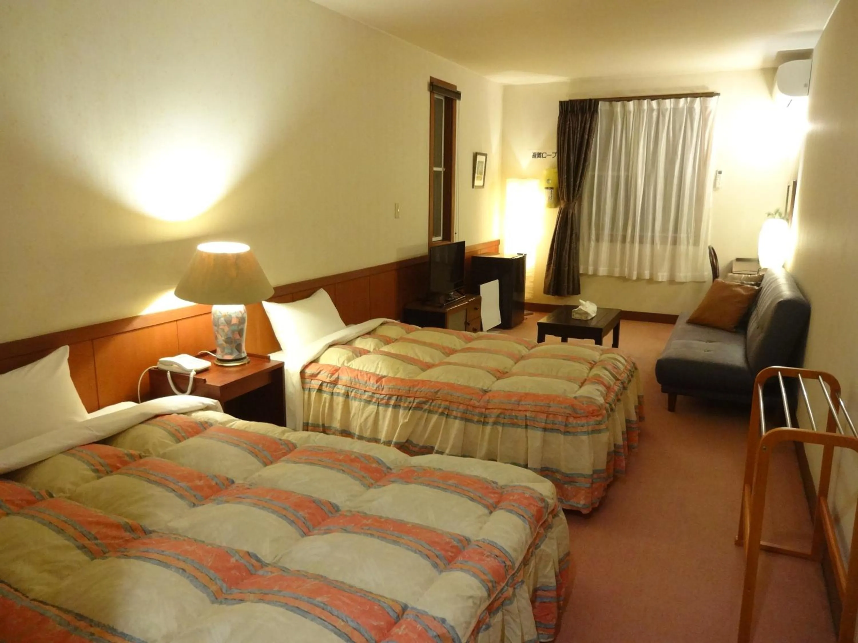 Photo of the whole room, Bed in IZUNA INN & SPA - the veggie delights