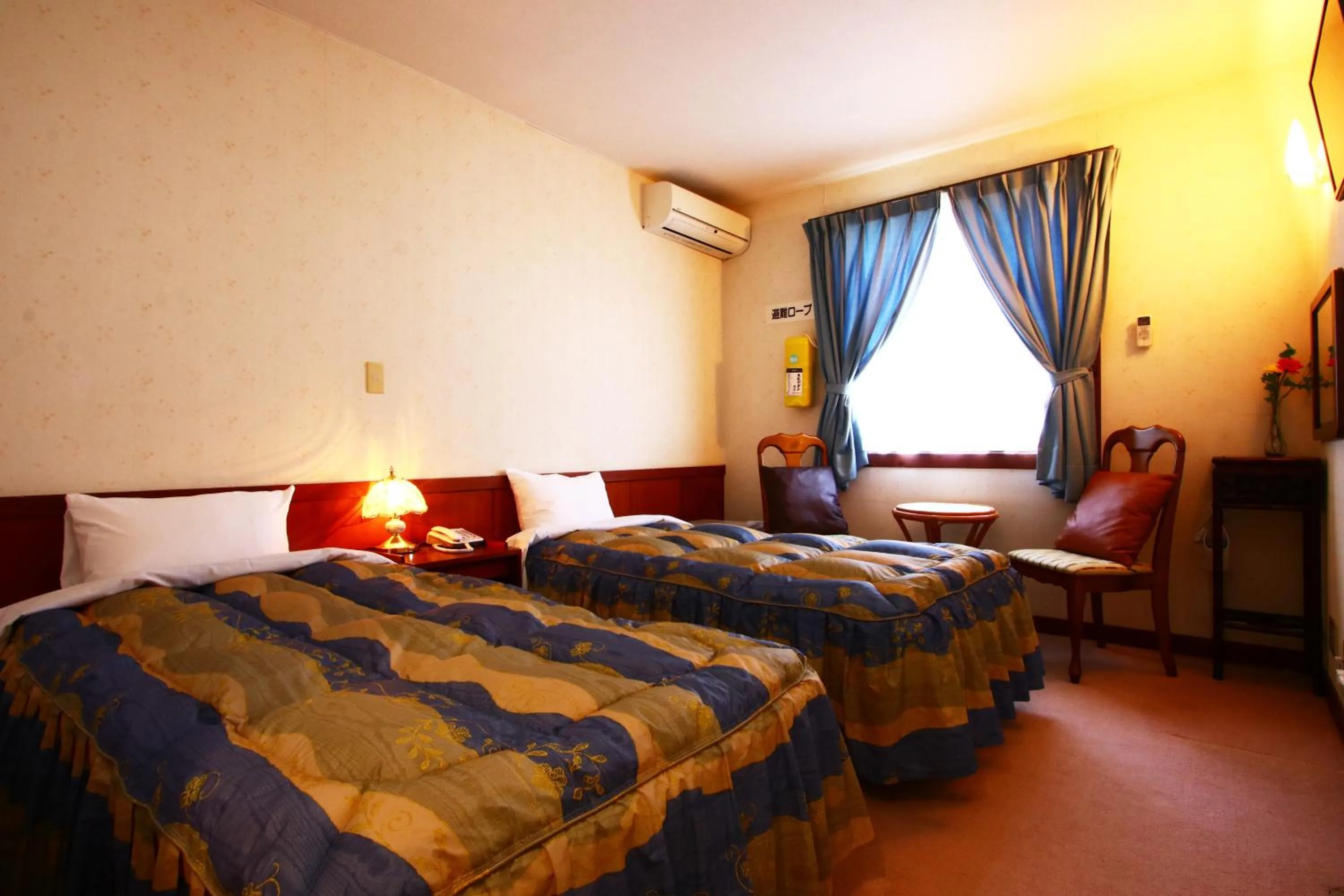 Photo of the whole room, Bed in IZUNA INN & SPA - the veggie delights