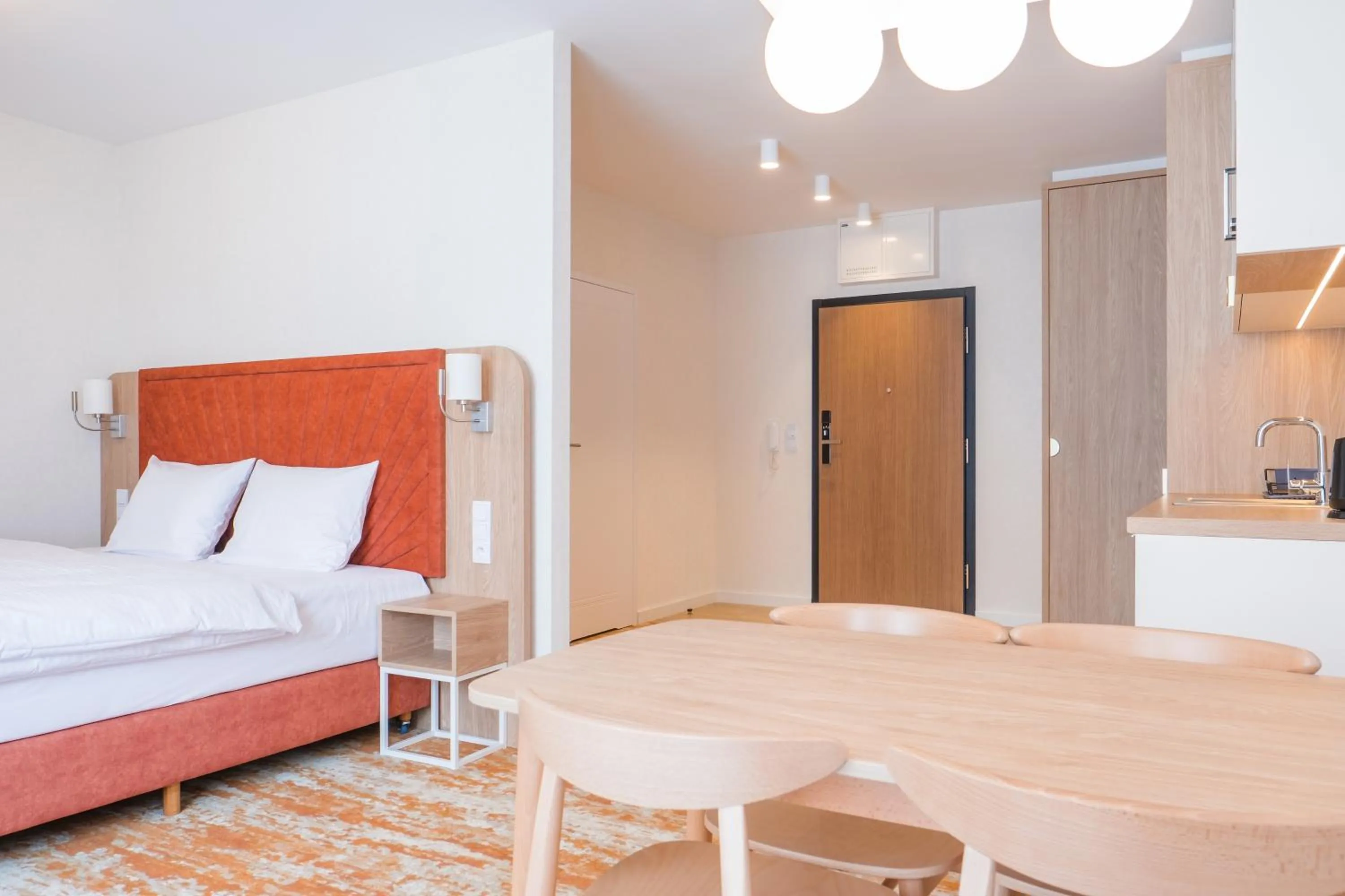 Kitchen or kitchenette, Bed in AQUA Resort AQUAPARK