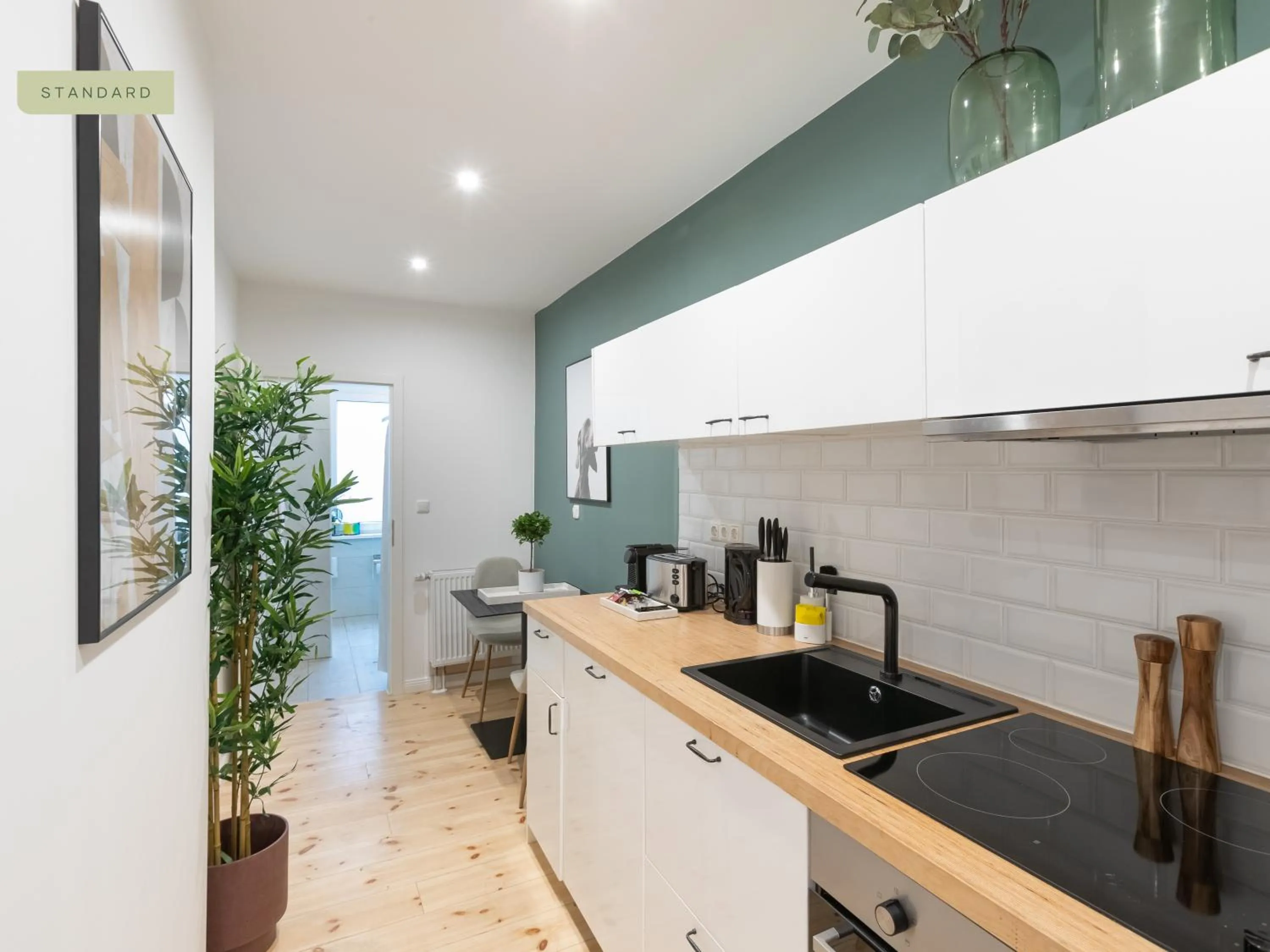 Kitchen or kitchenette in Apartments Berlin Aroser Allee