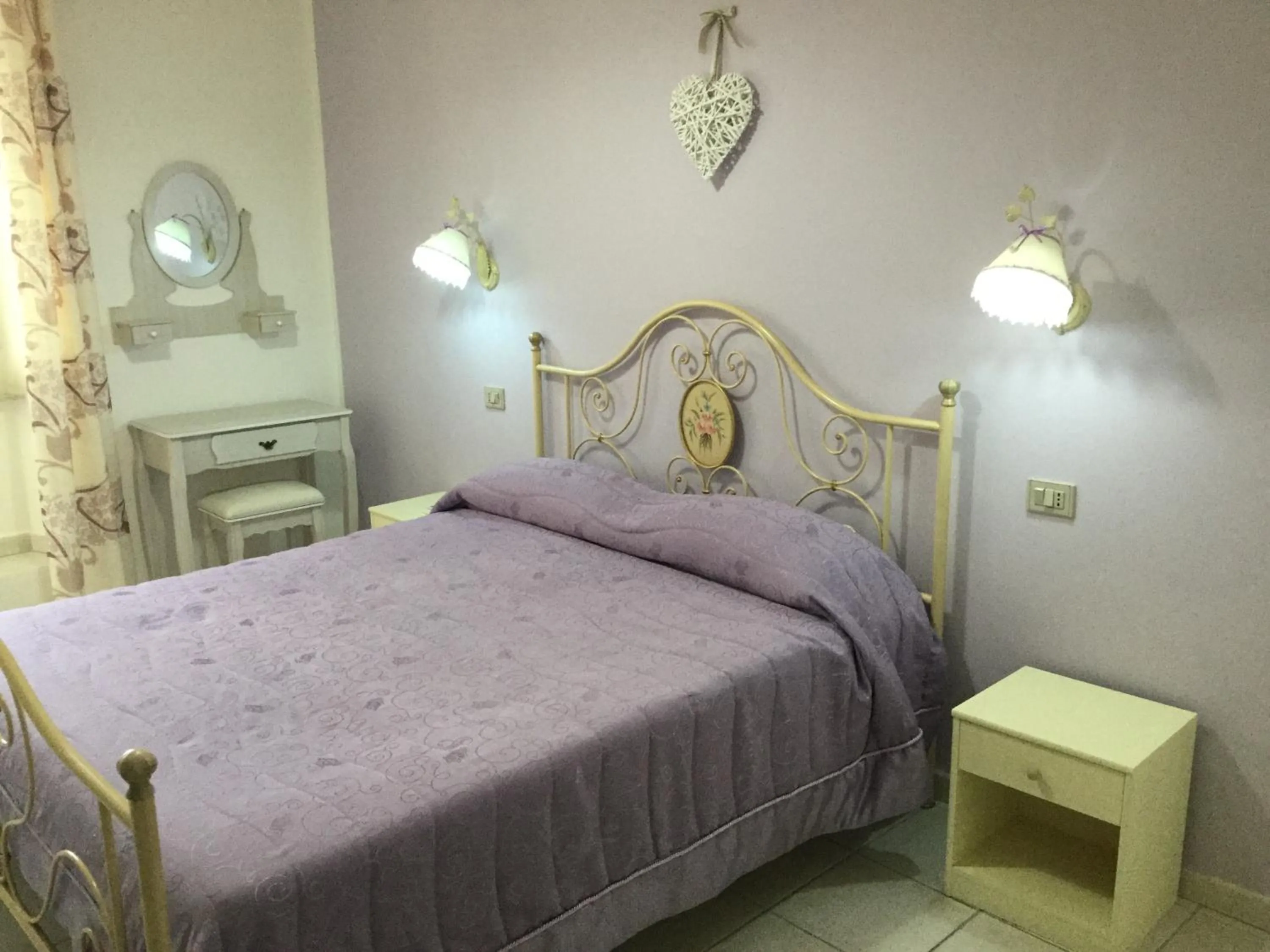 Photo of the whole room, Bed in Il Melangolo