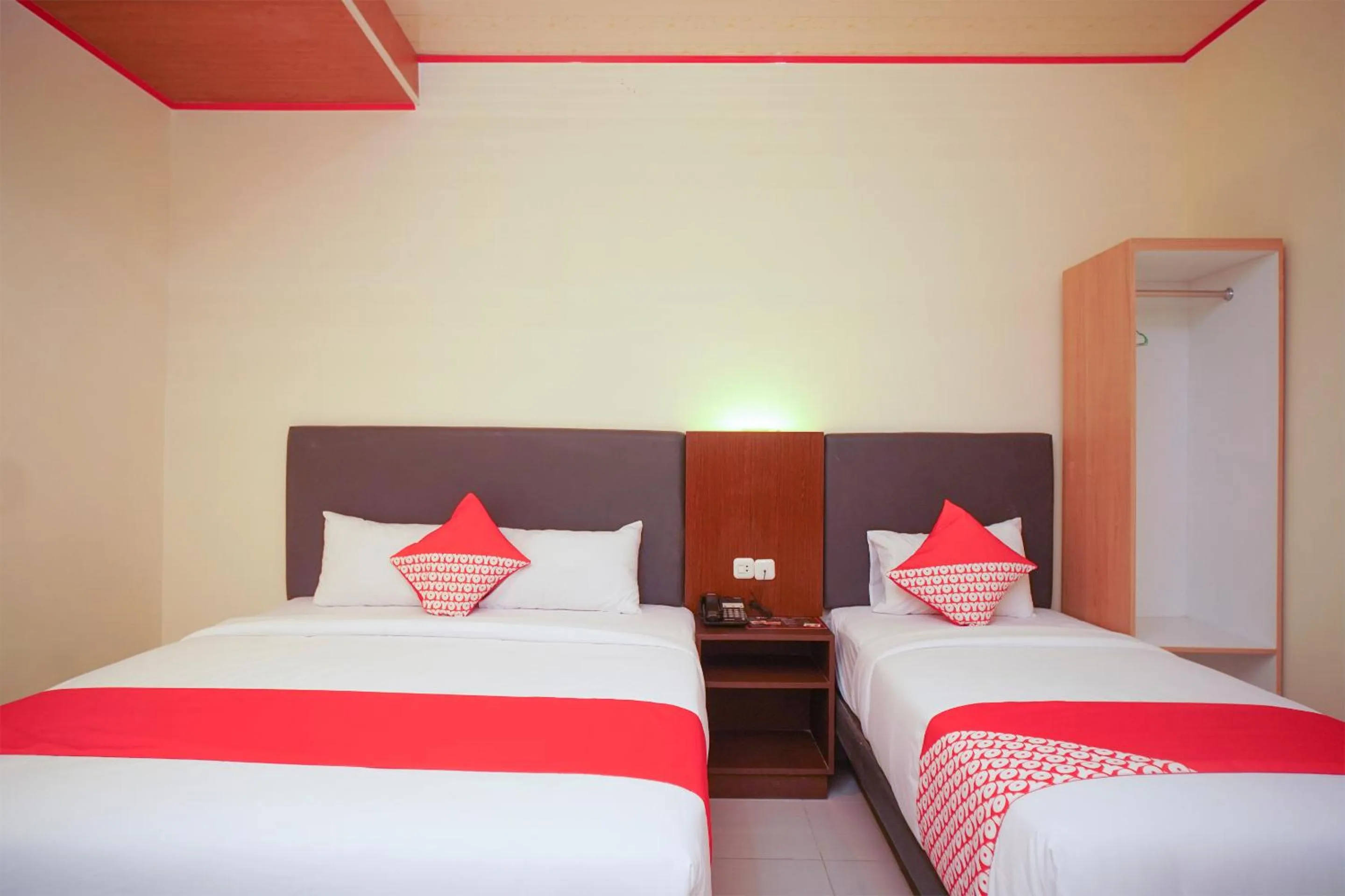 Bedroom in OYO 147 Hotel Winer