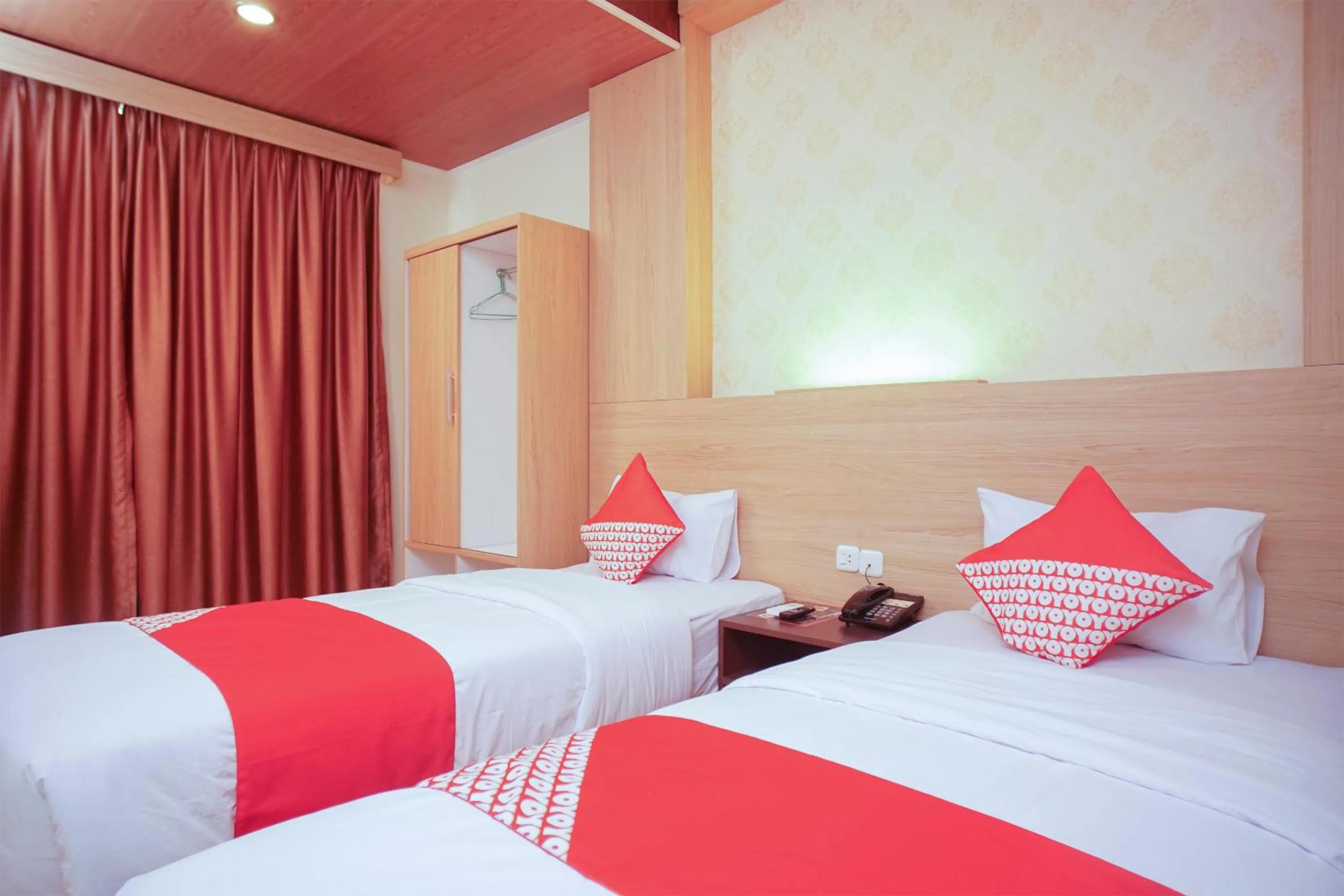 Bedroom in OYO 147 Hotel Winer