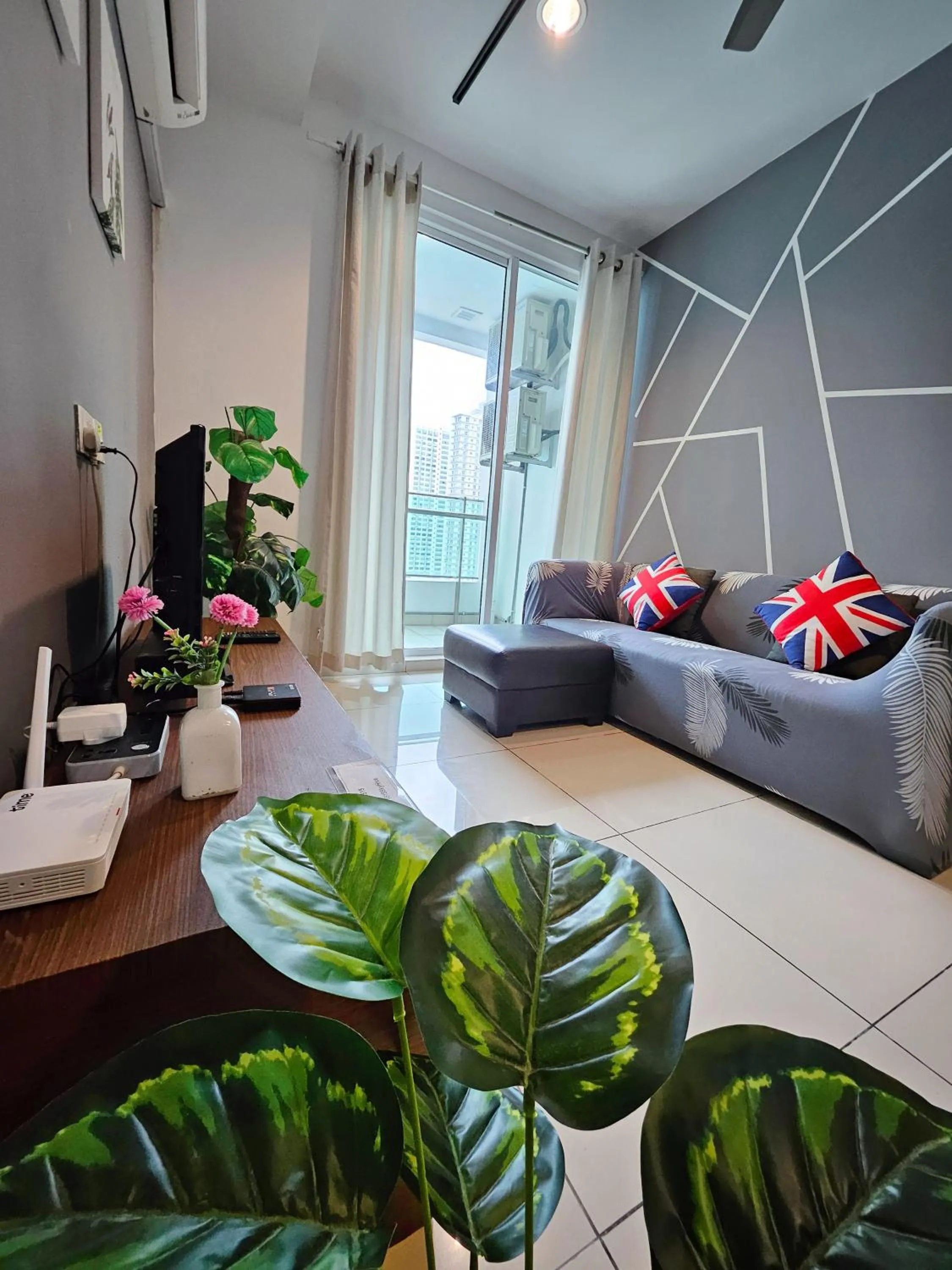 Living room in Mansion One by Sky Hive