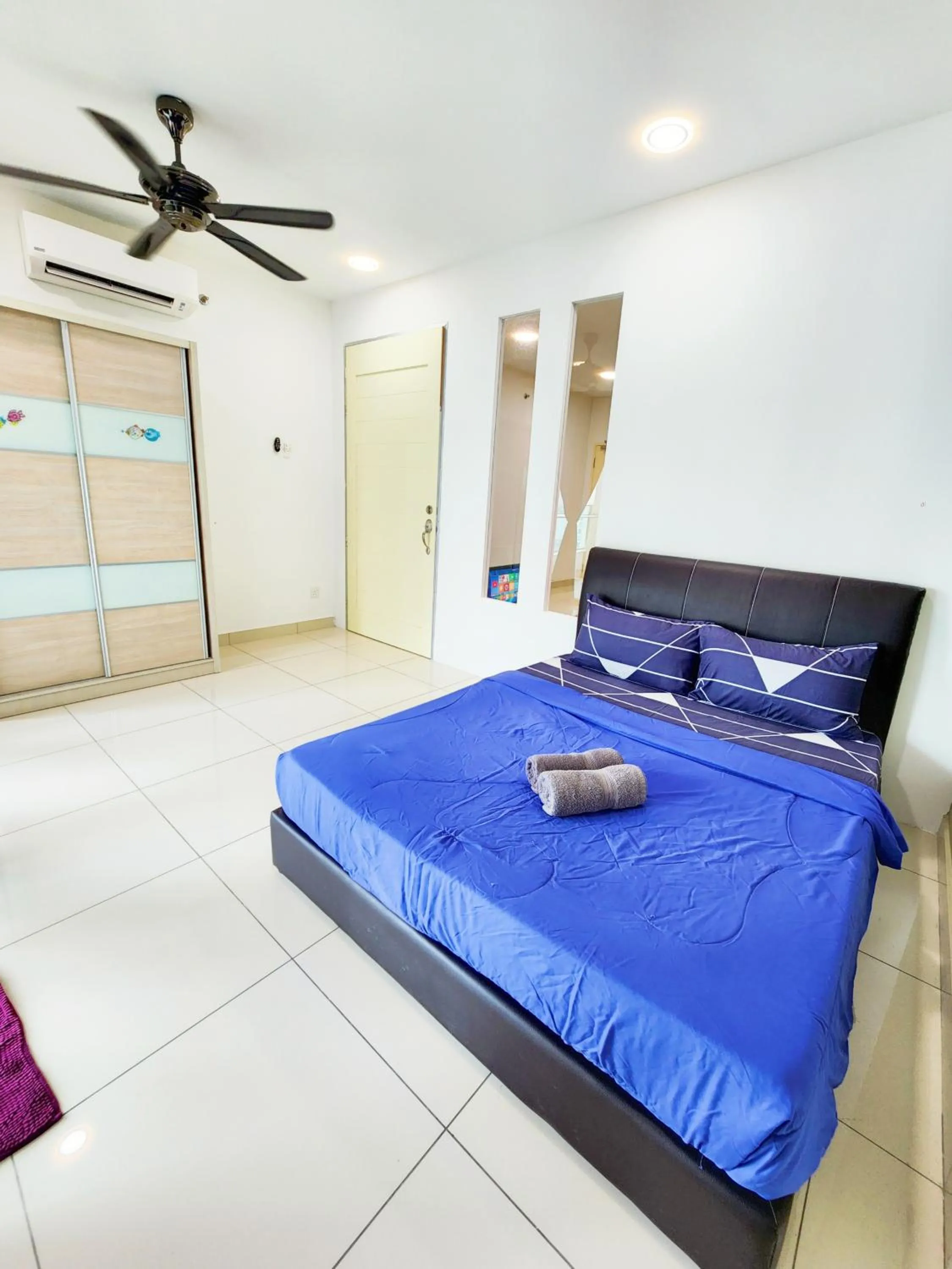 Bed in Mansion One by Sky Hive