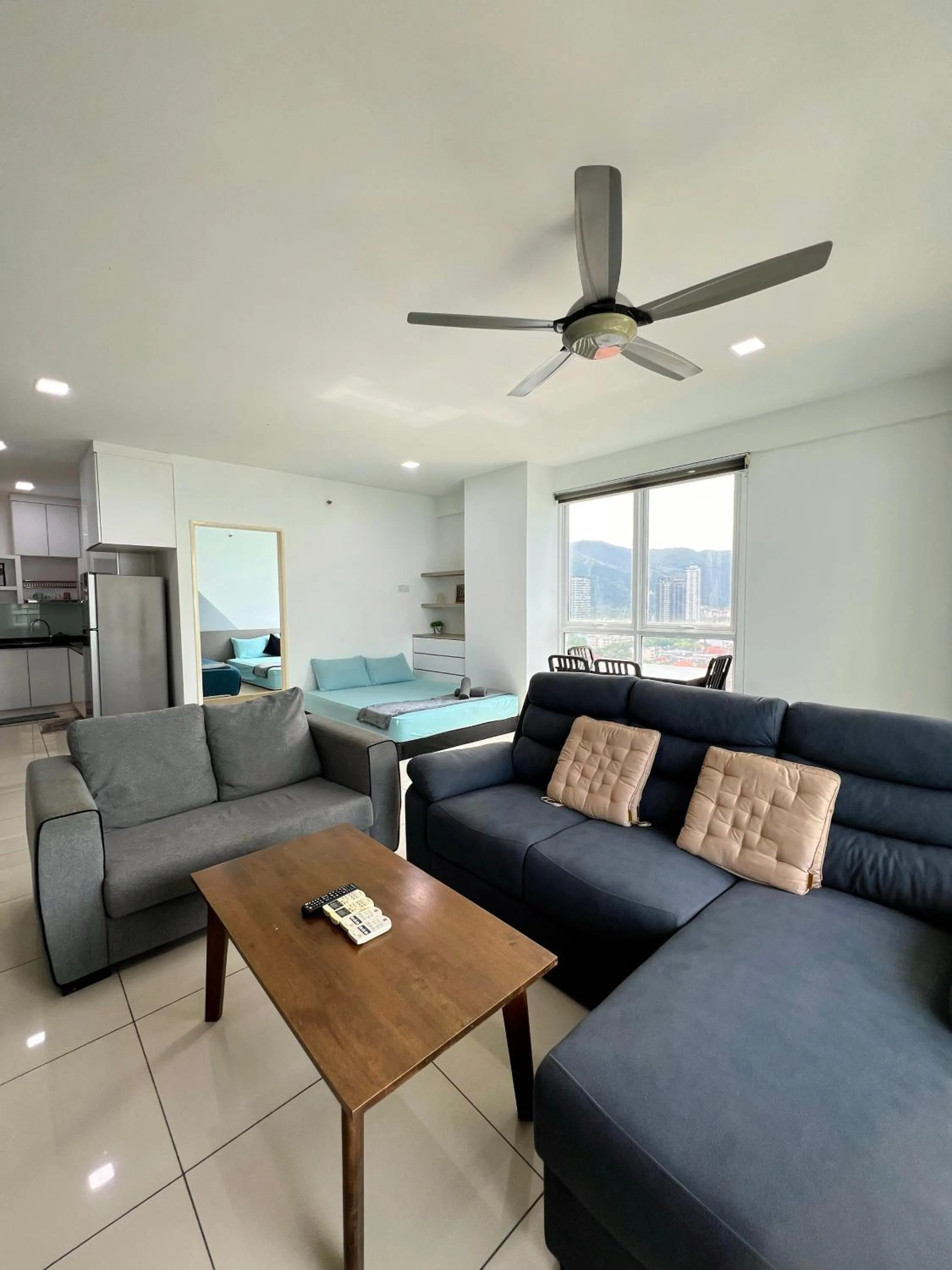 Living room in Mansion One by Sky Hive