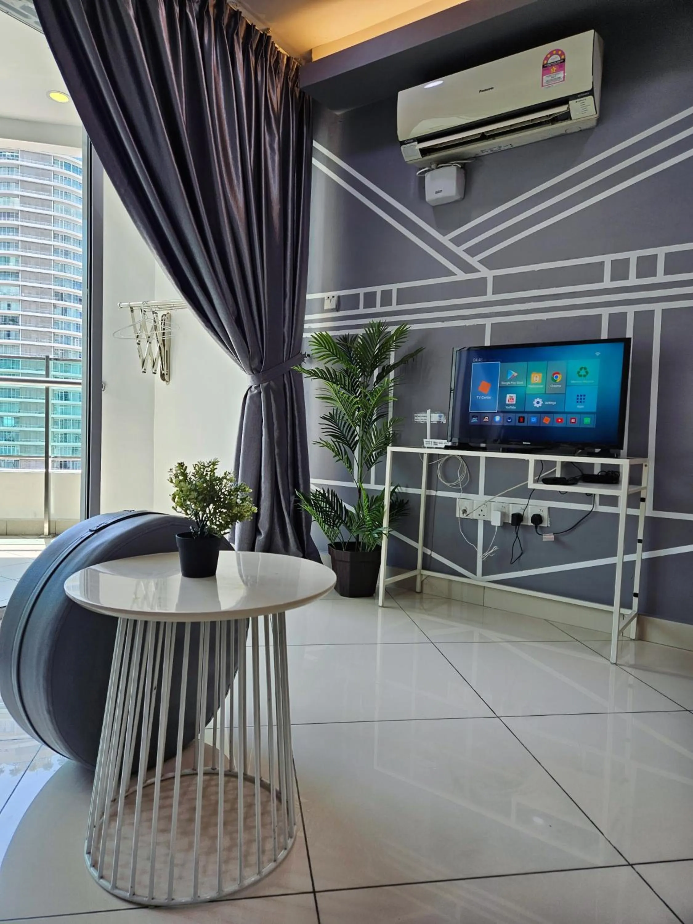 Living room in Mansion One by Sky Hive