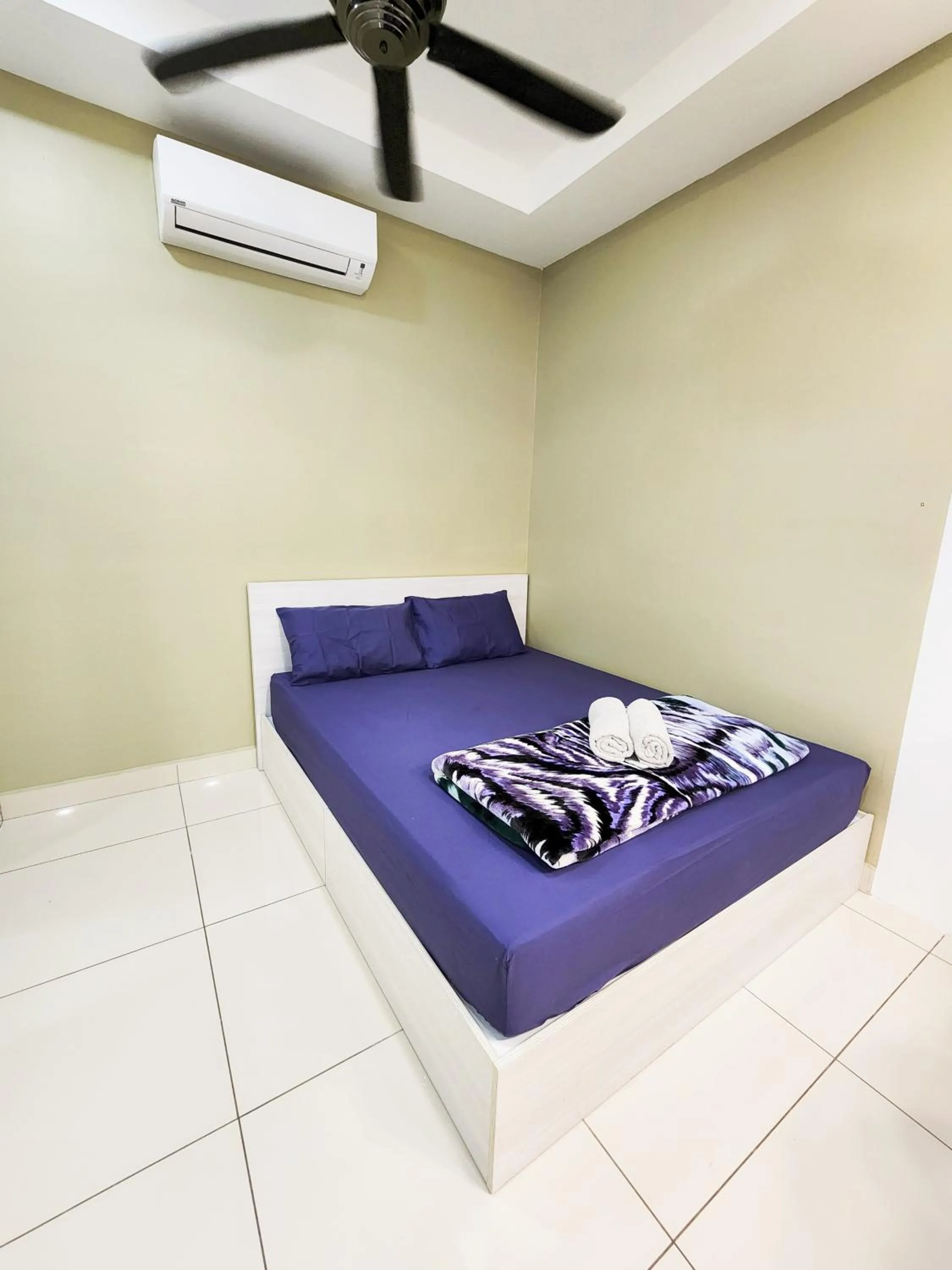 Bed in Mansion One by Sky Hive