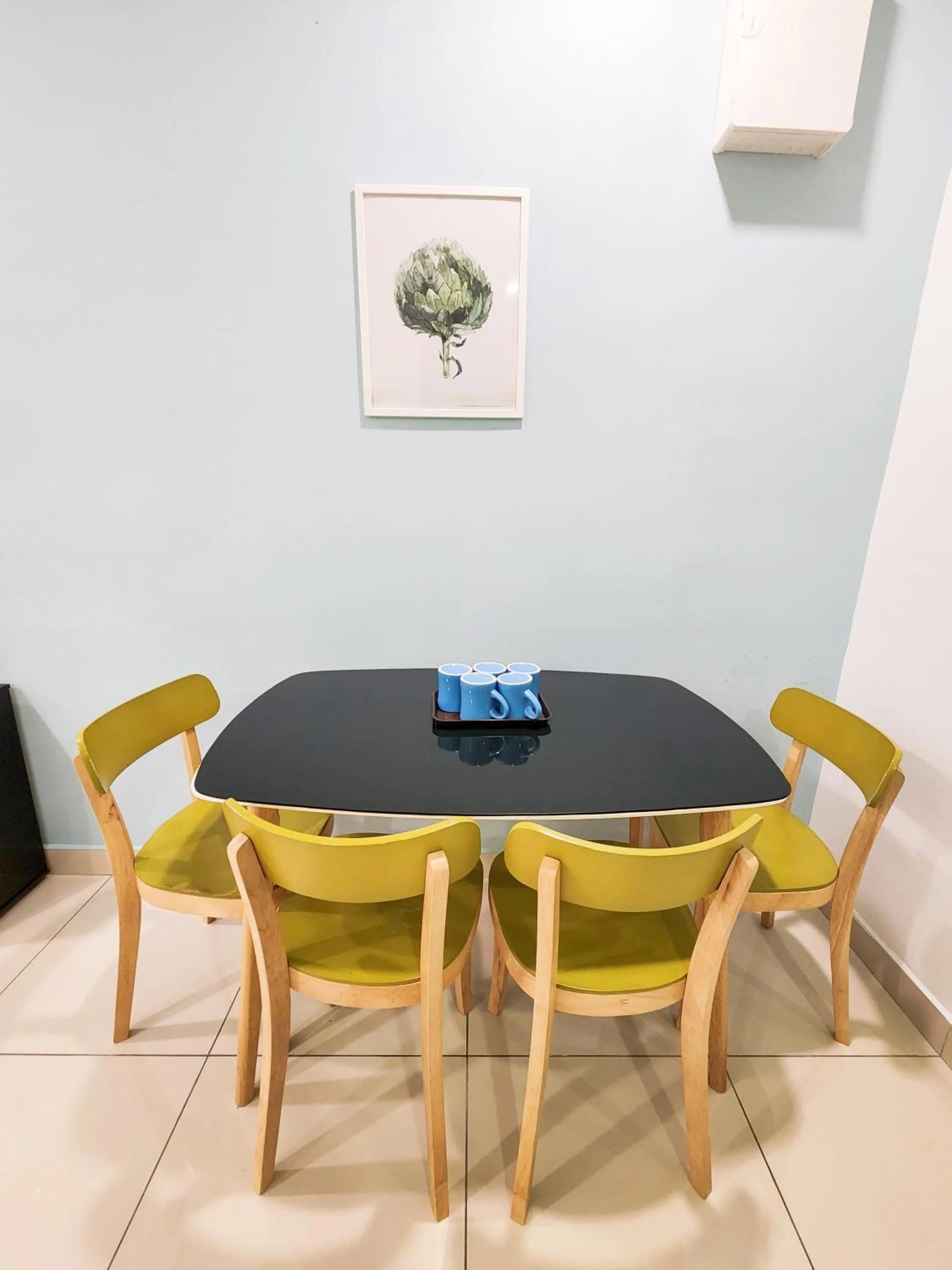 Dining area in Mansion One by Sky Hive