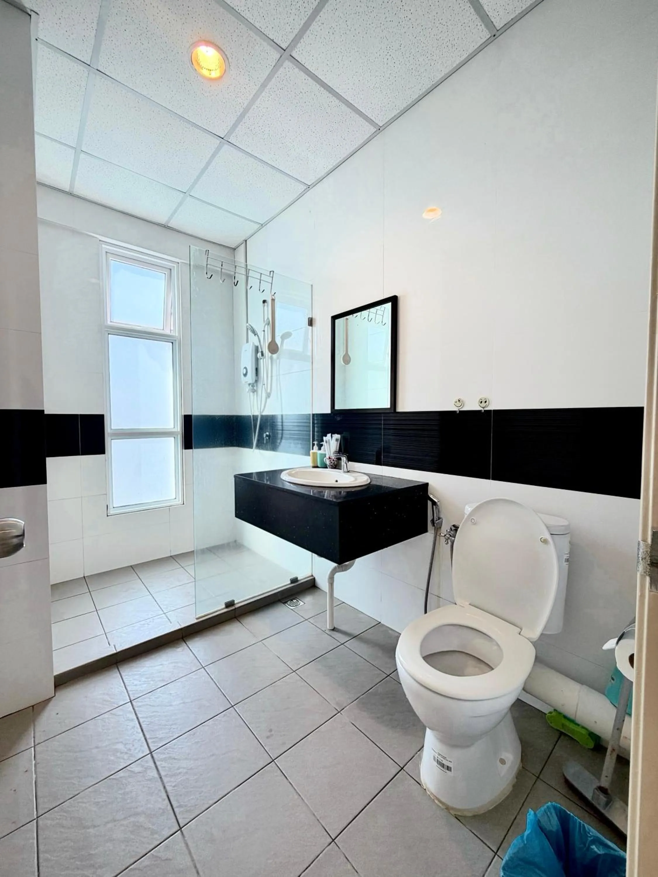 Toilet in Mansion One by Sky Hive