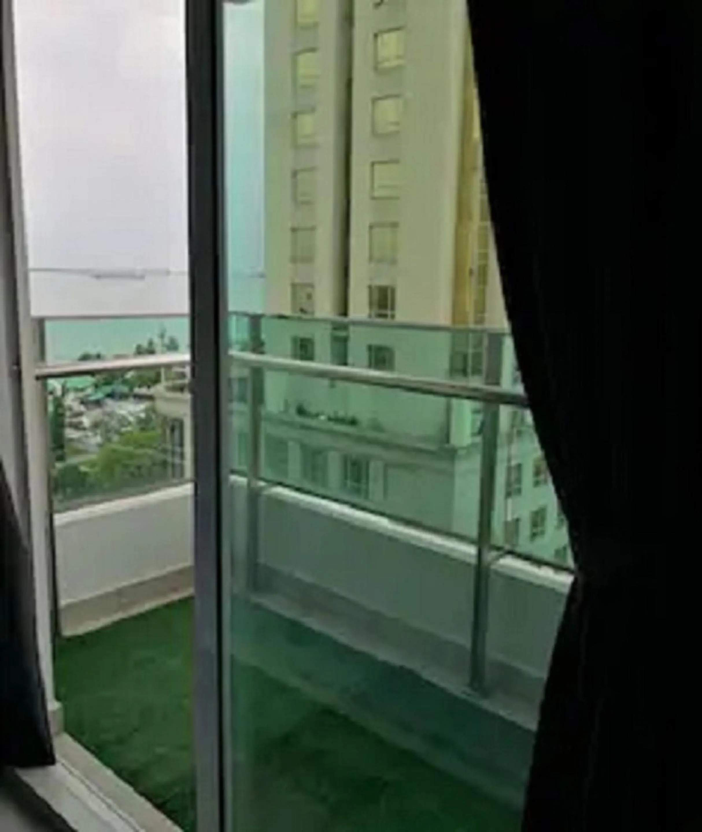 Balcony/Terrace in Mansion One by Sky Hive