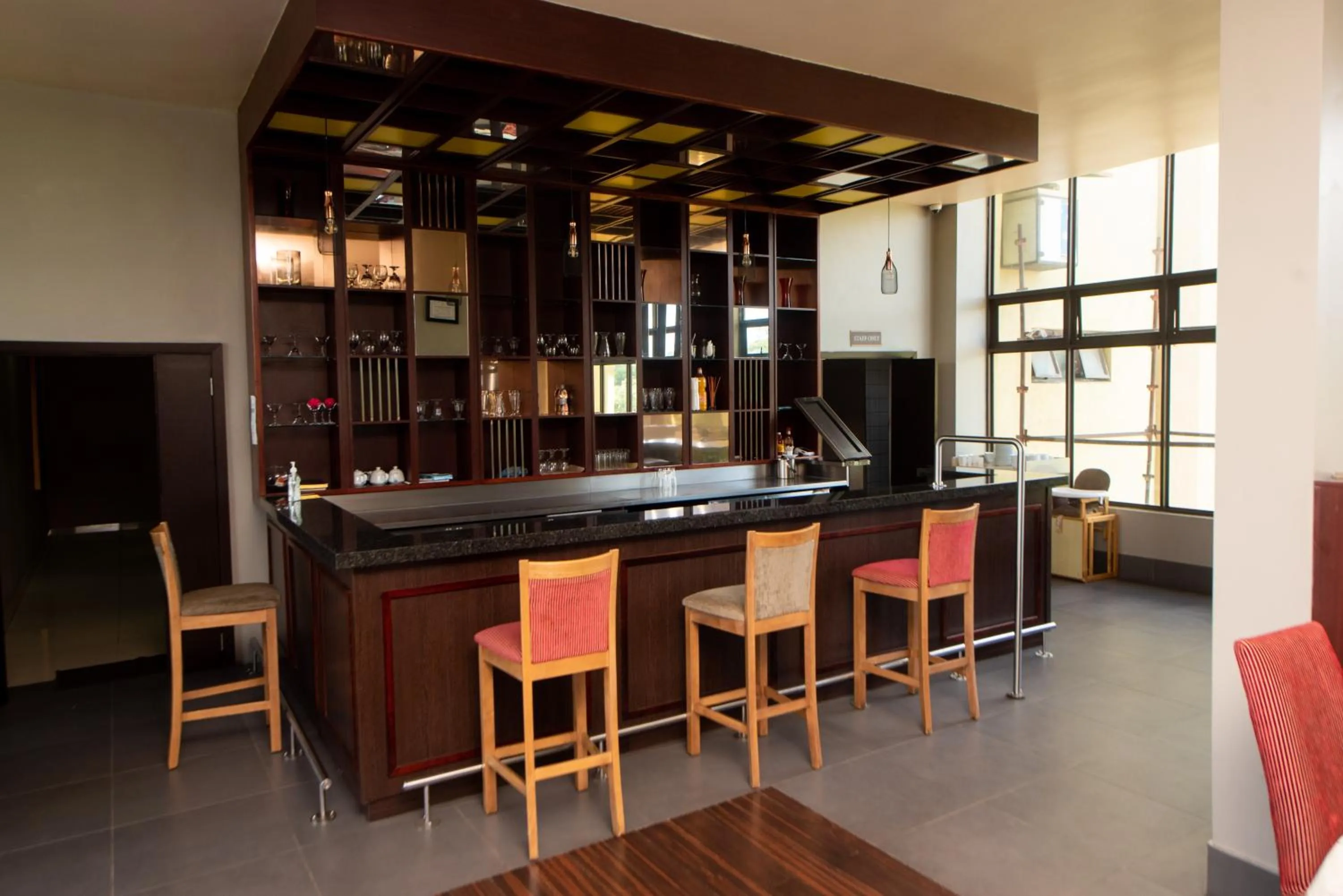 Lounge or bar in Crossroads Hotel Blantyre