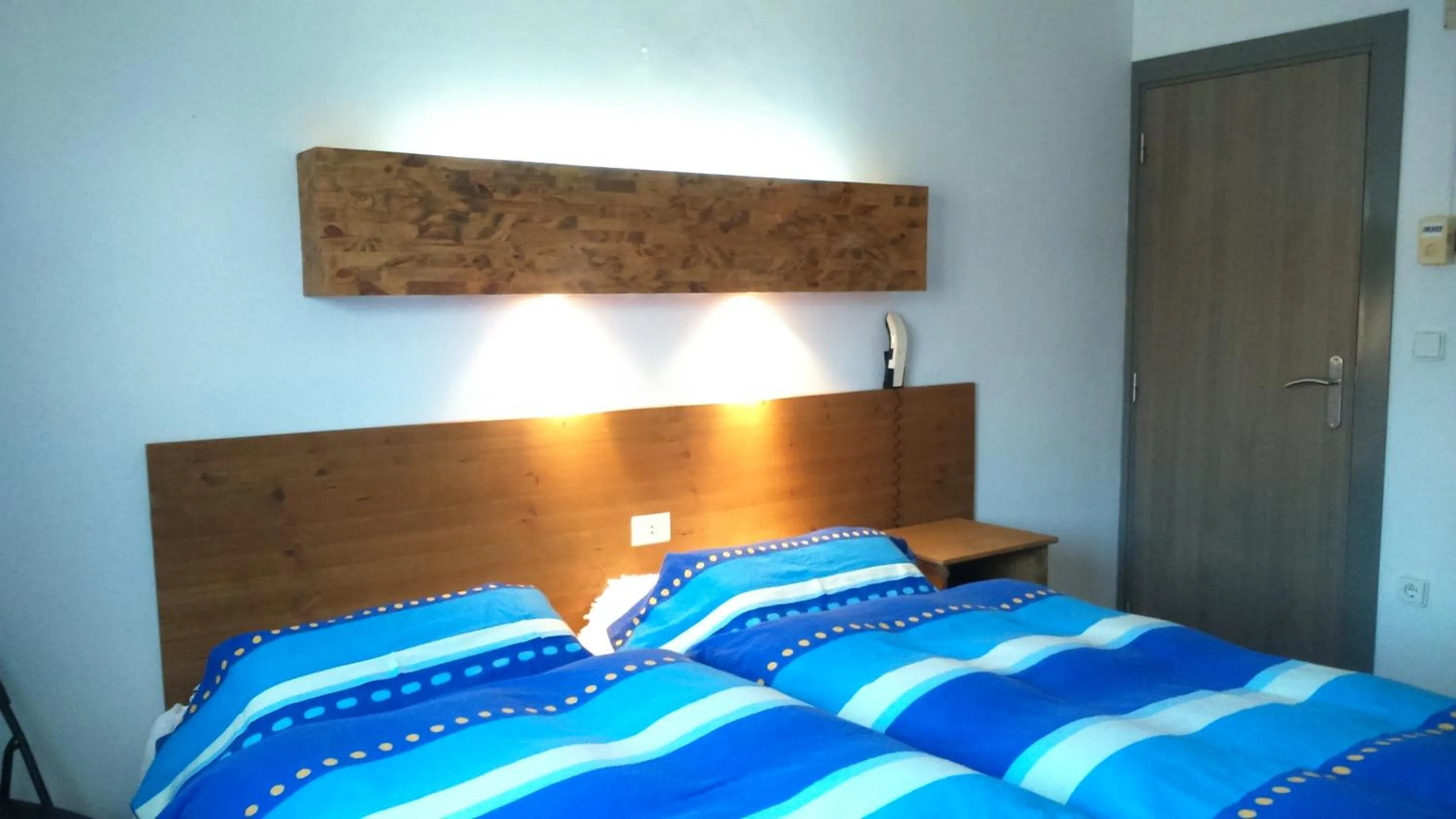 Photo of the whole room, Bed in La Masia