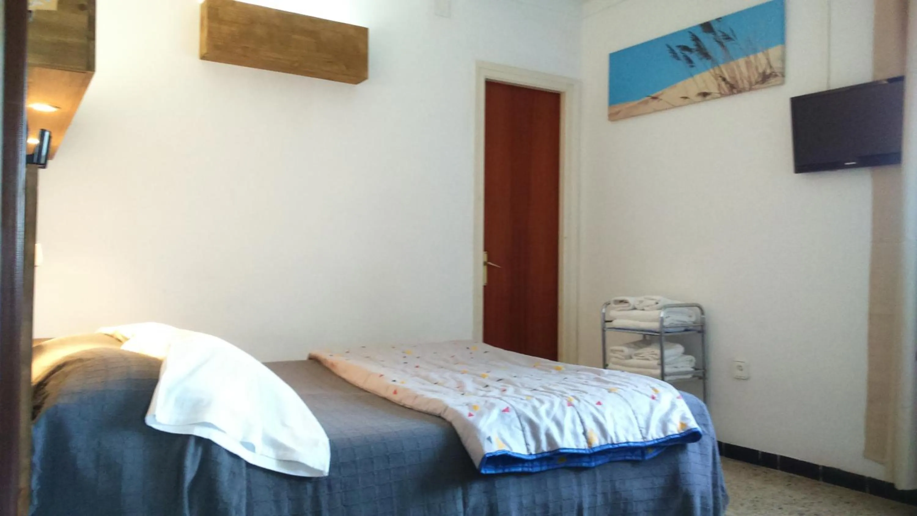 Photo of the whole room, Bed in La Masia