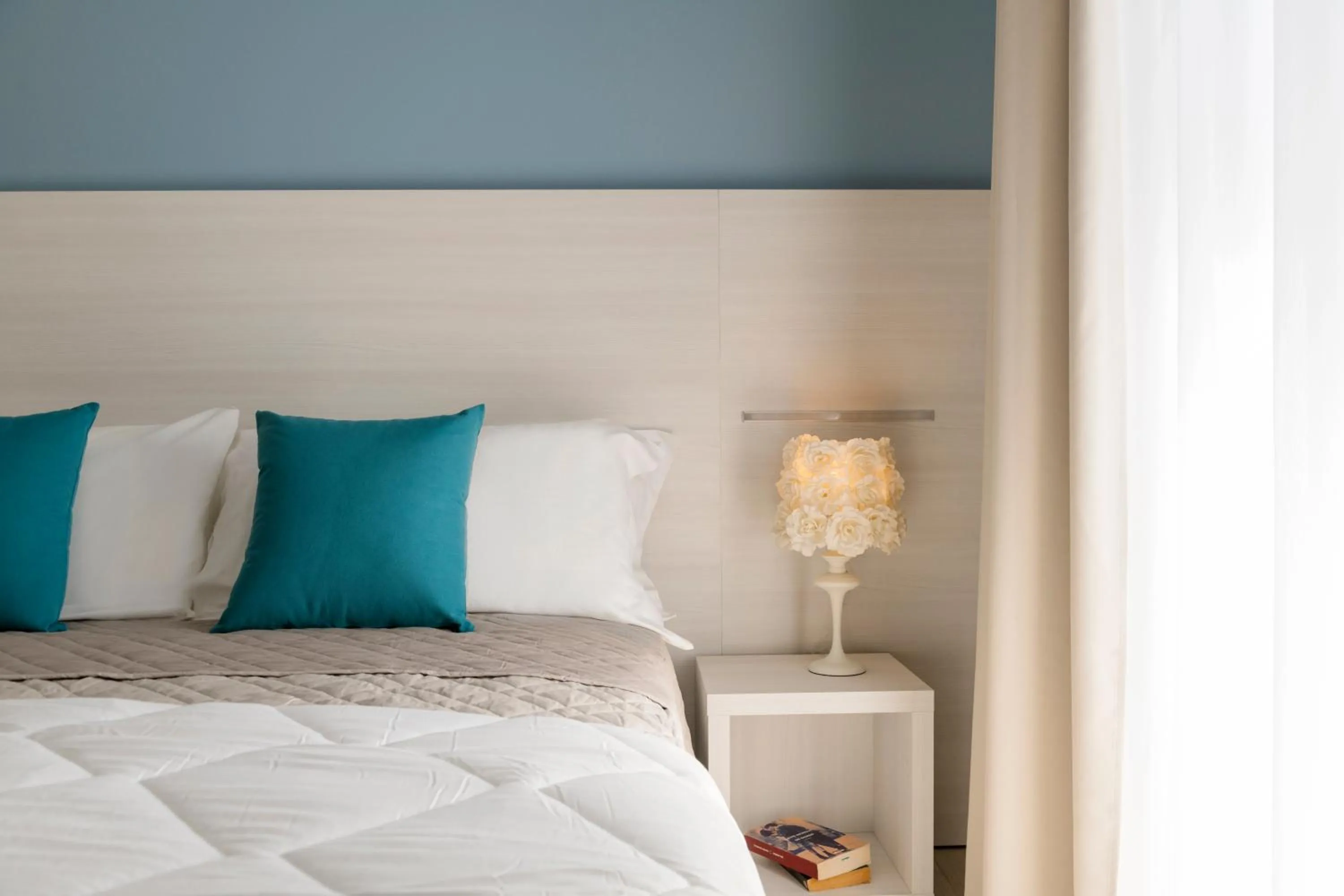 Bed in Hotel Raffaello