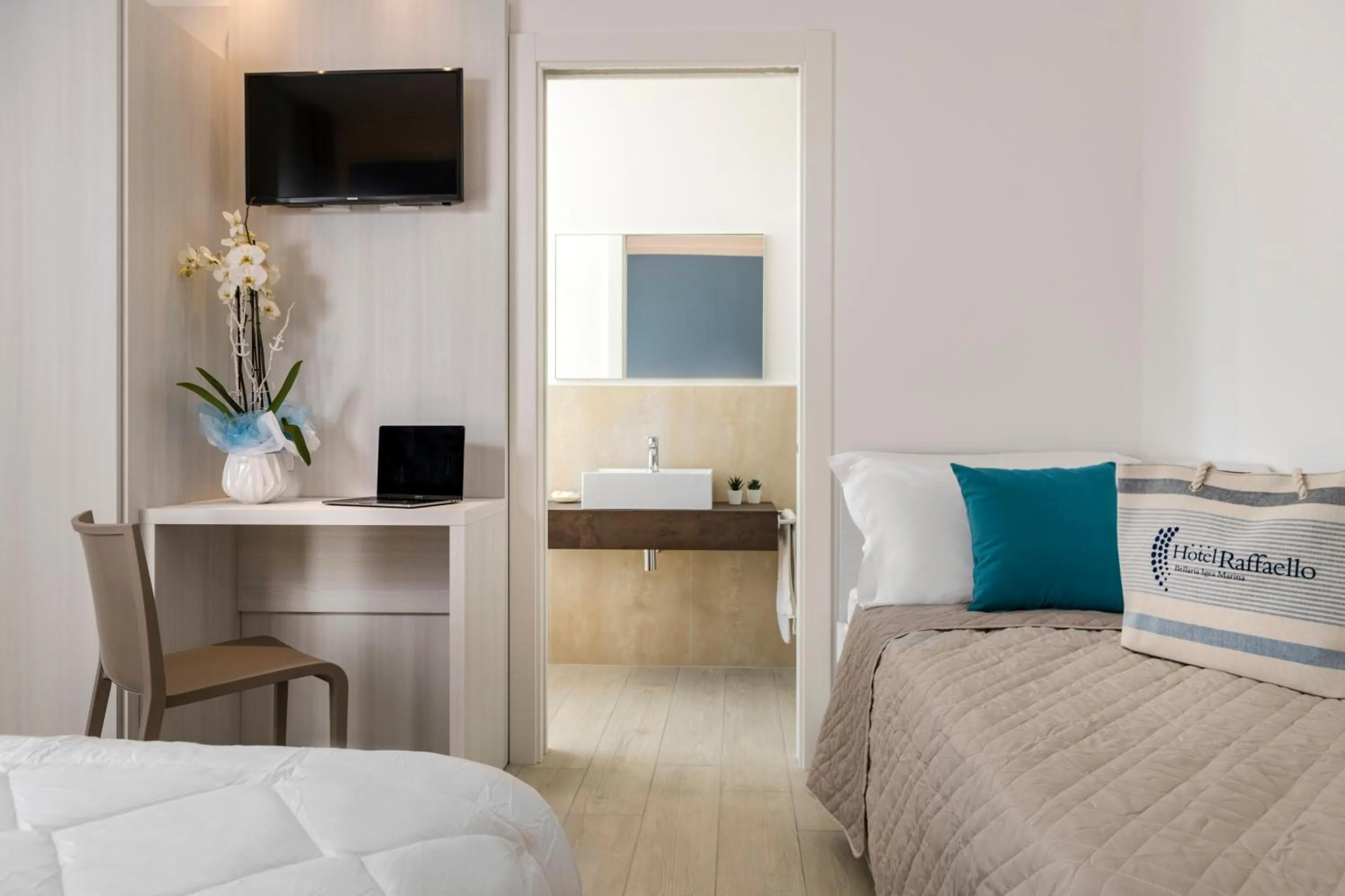 Bed in Hotel Raffaello