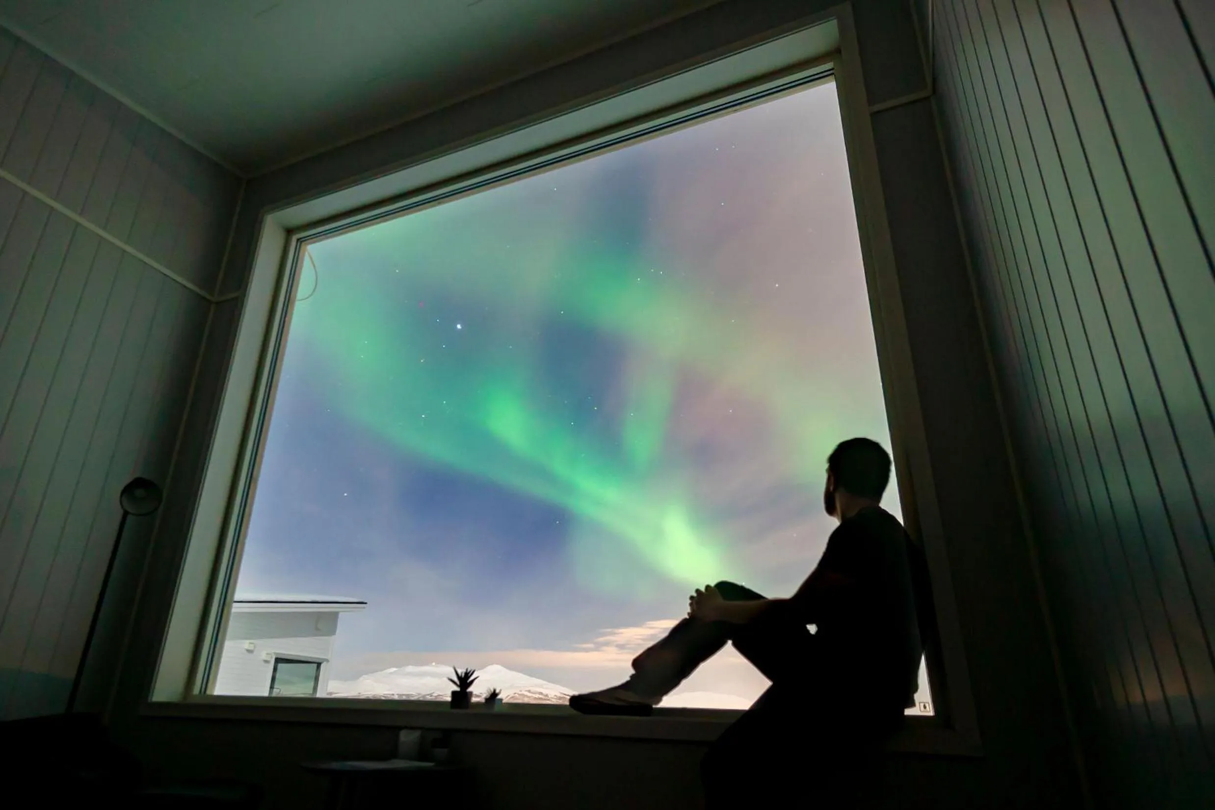 People in Aurora Borealis Observatory