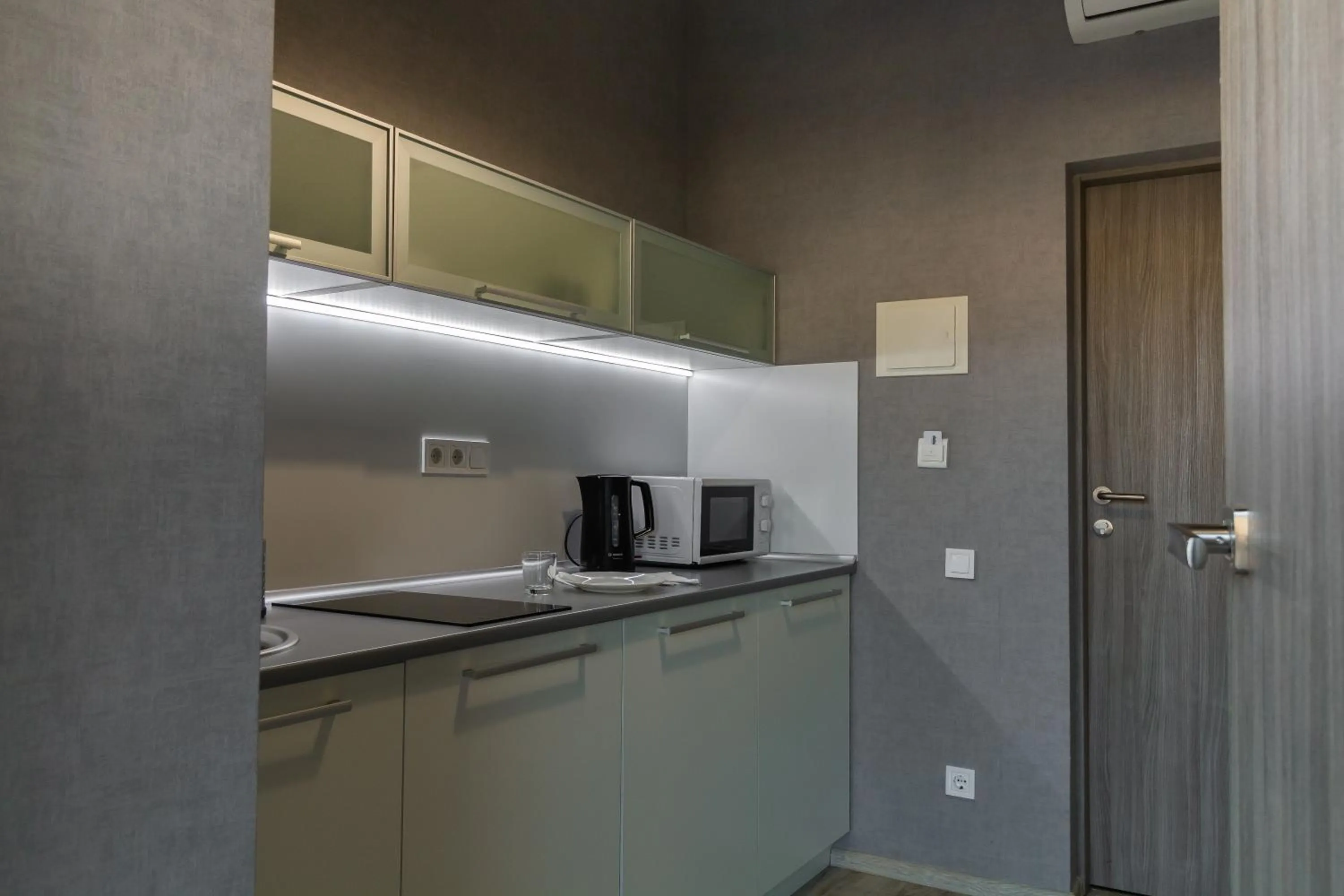 Kitchen or kitchenette in Opera Passage Hotel & Apartments
