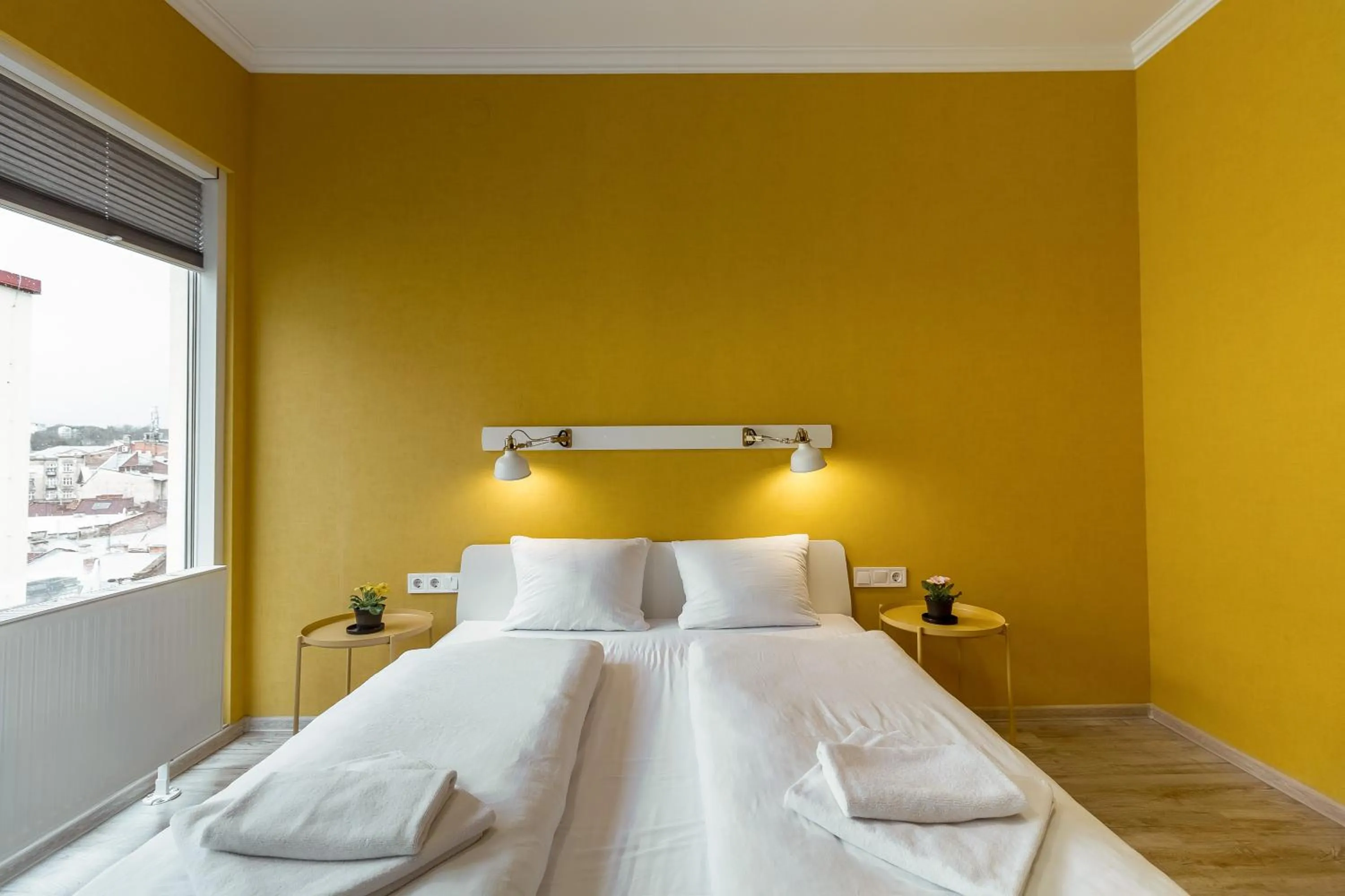 Bed in Opera Passage Hotel & Apartments