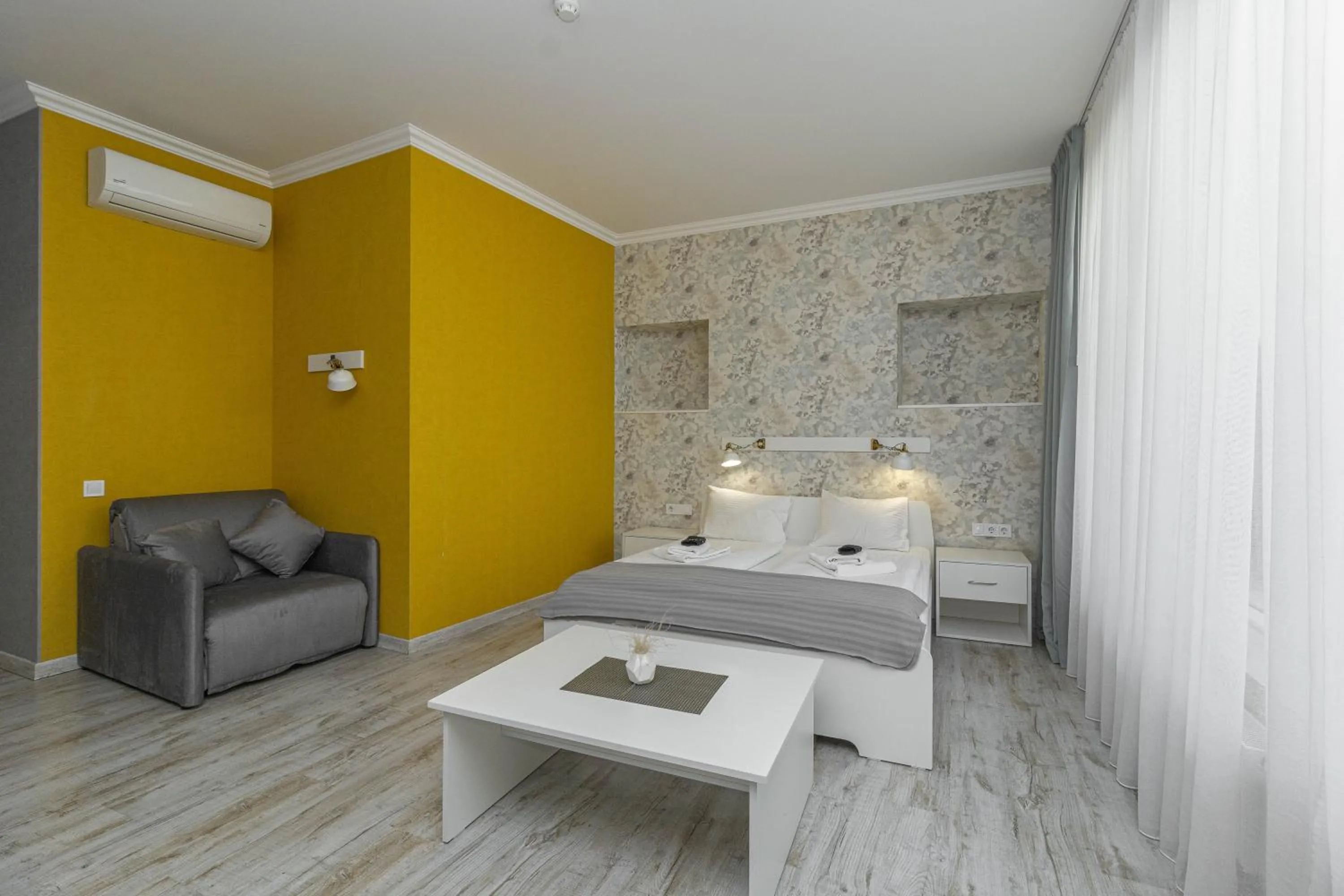 Bed in Opera Passage Hotel & Apartments