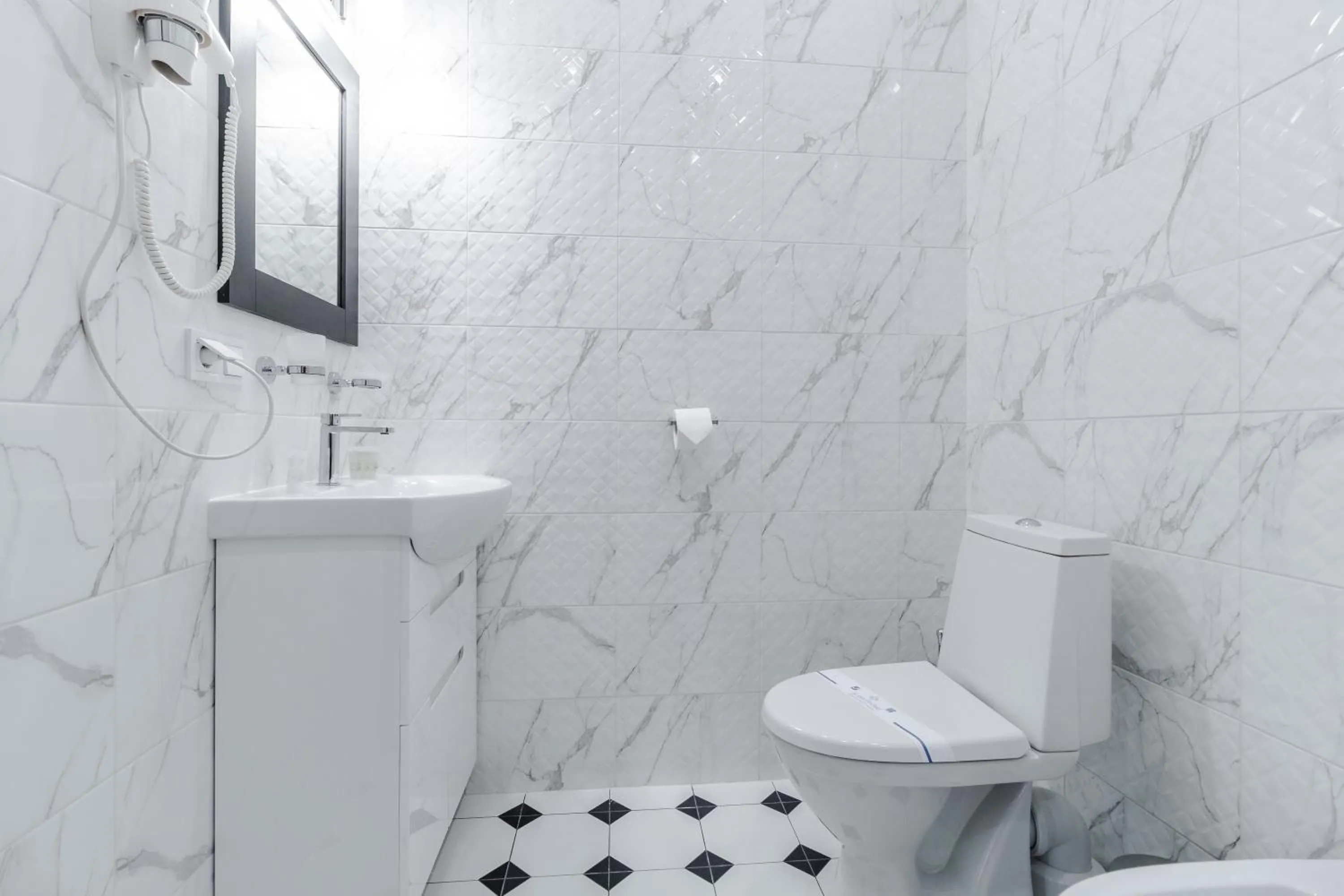 Toilet in Opera Passage Hotel & Apartments