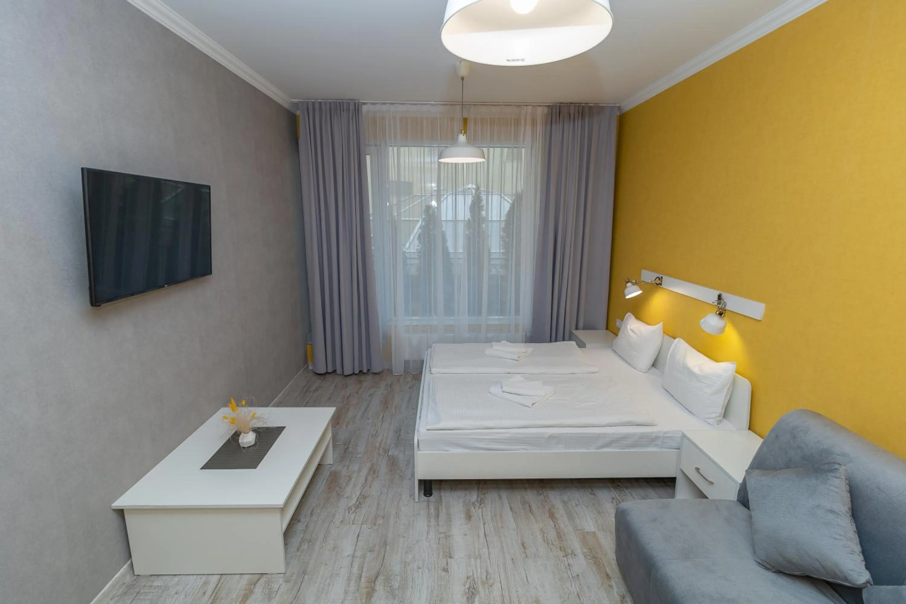 Bed in Opera Passage Hotel & Apartments