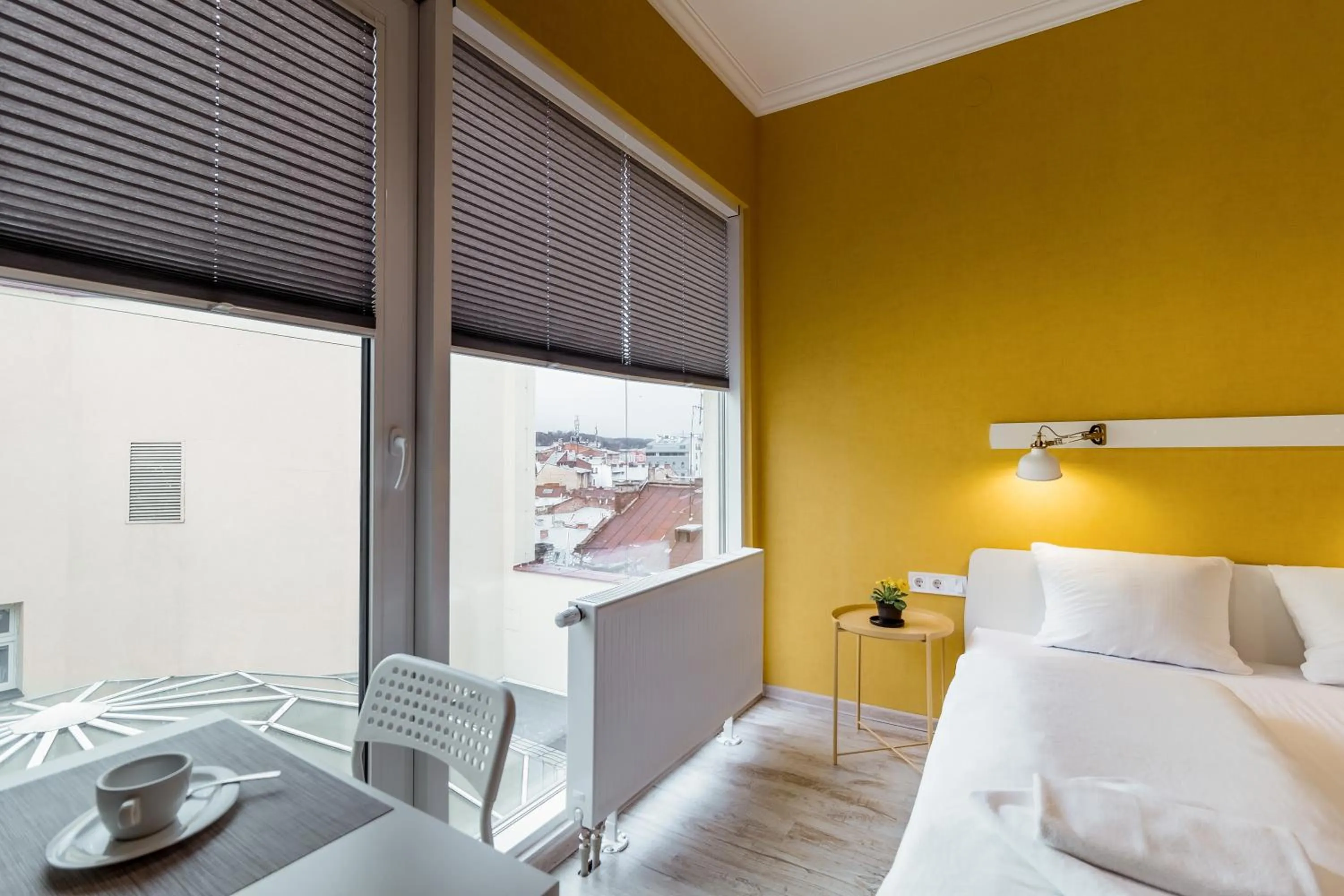 Bed in Opera Passage Hotel & Apartments