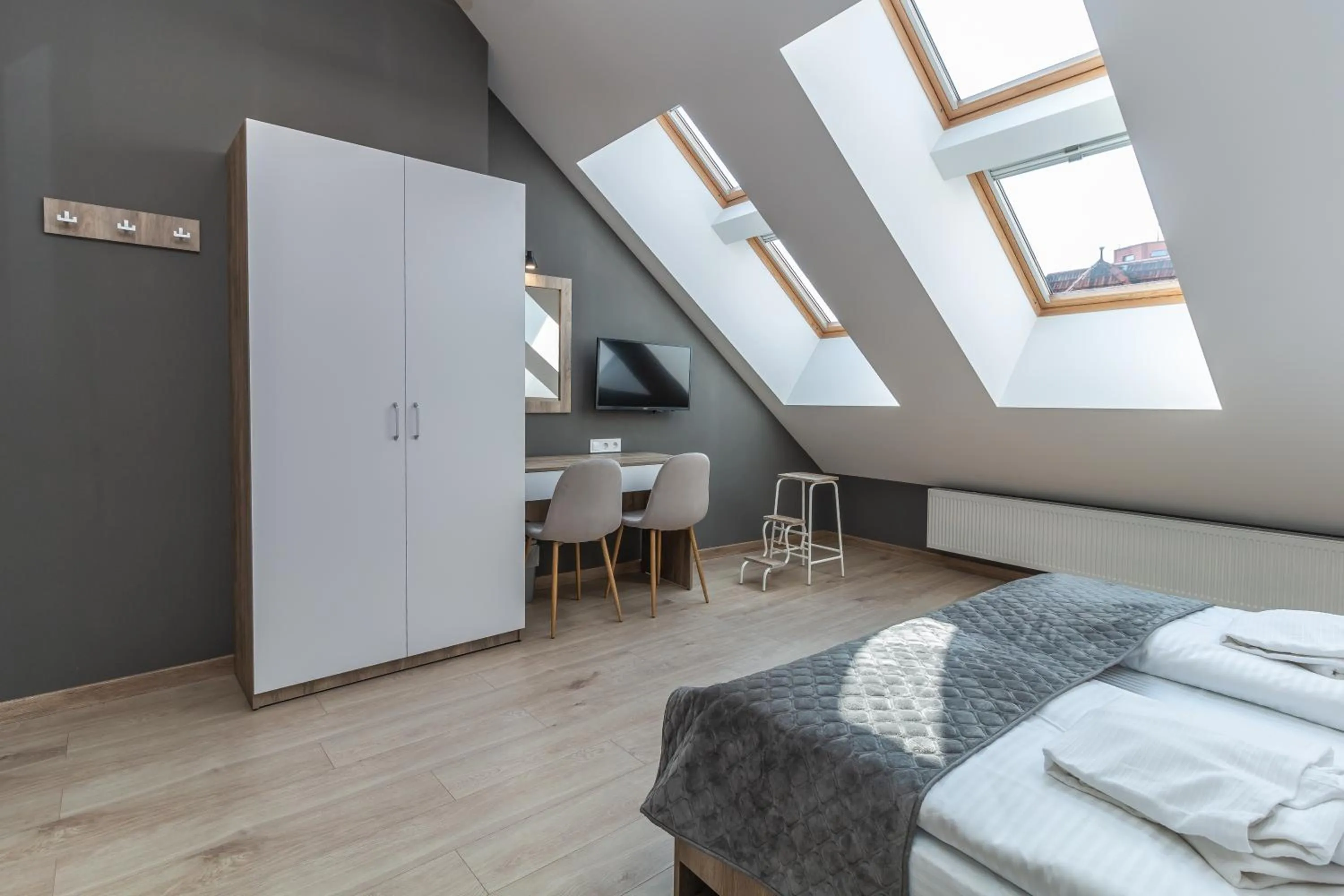 Bed in Opera Passage Hotel & Apartments