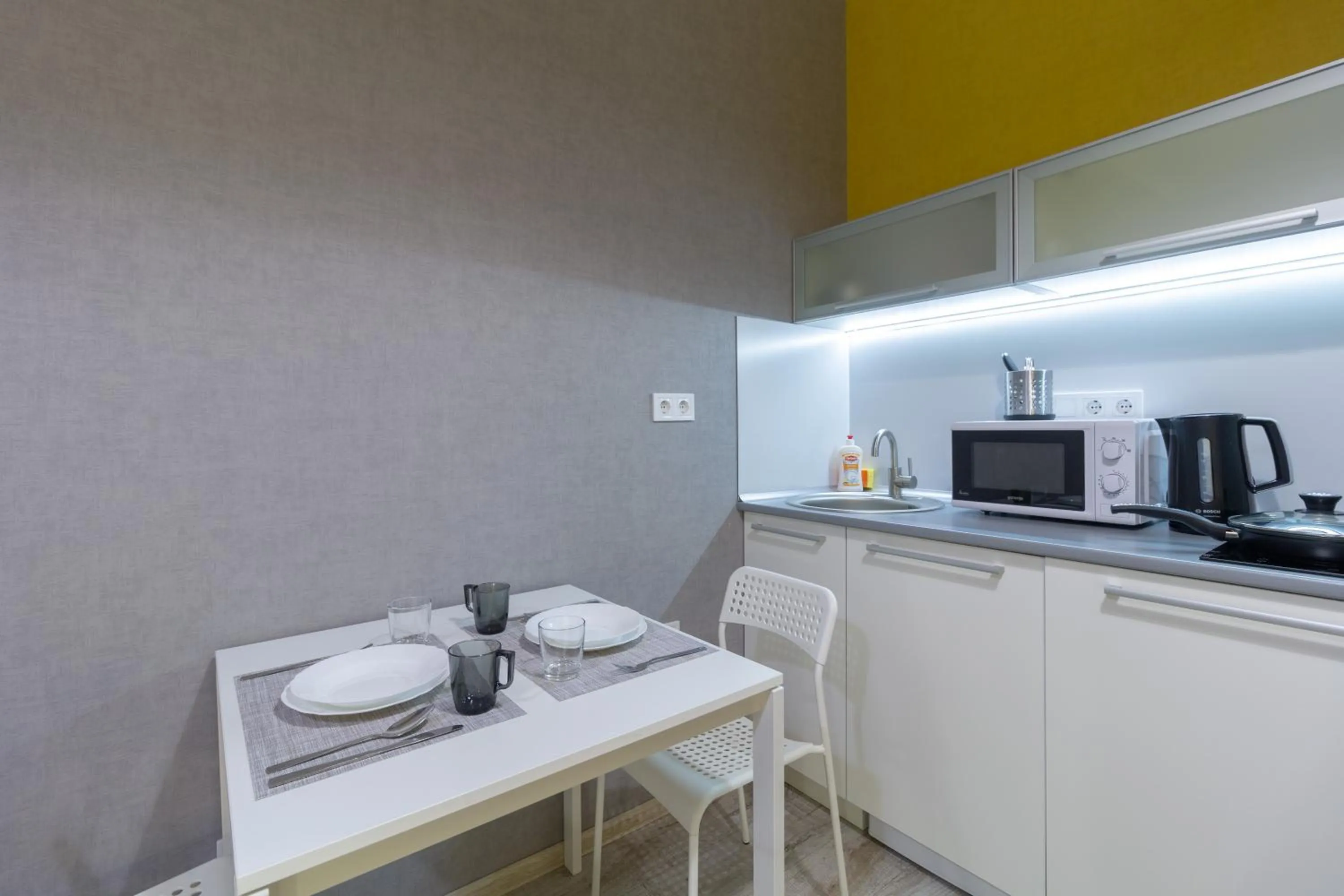 Kitchen or kitchenette in Opera Passage Hotel & Apartments