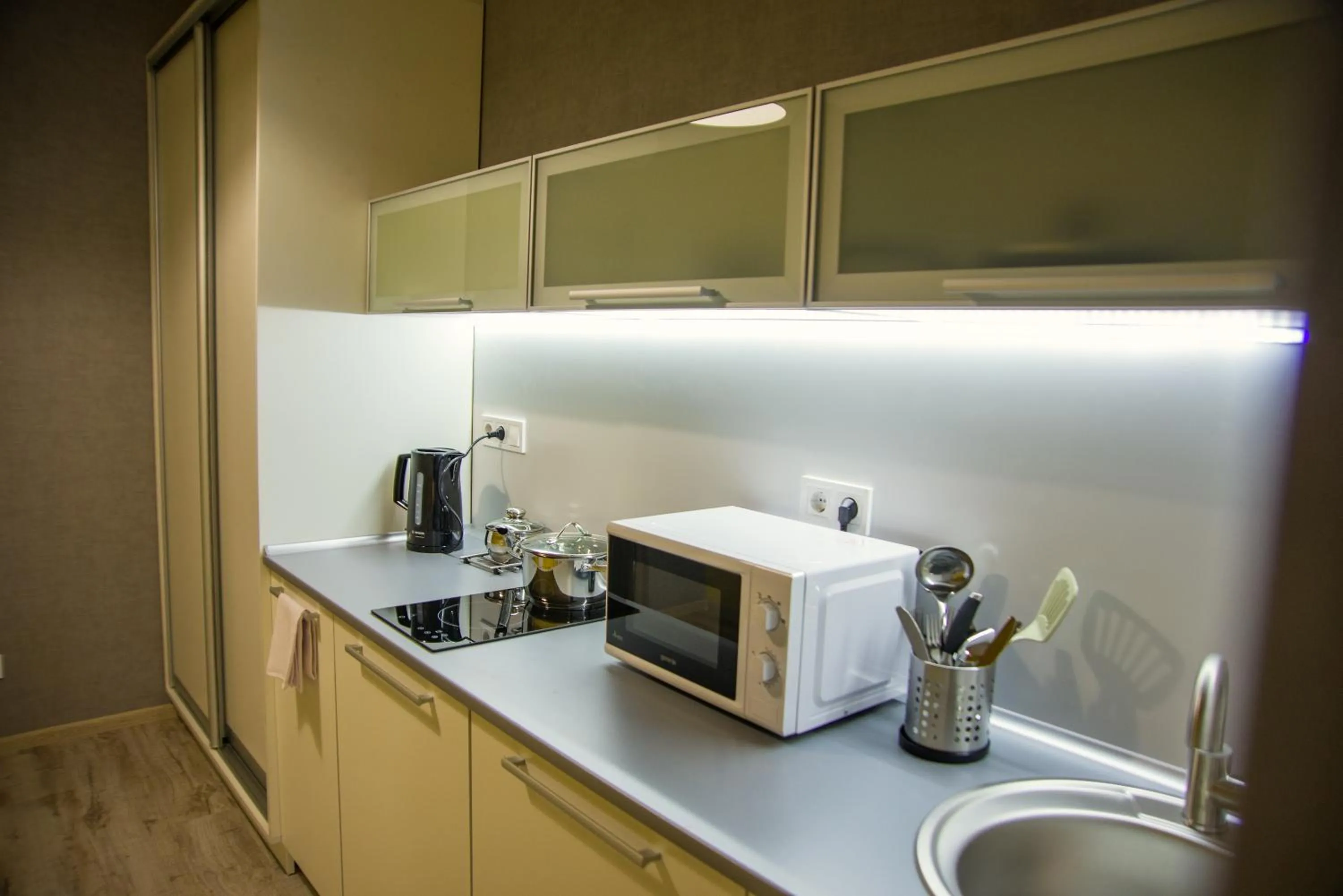Kitchen or kitchenette in Opera Passage Hotel & Apartments