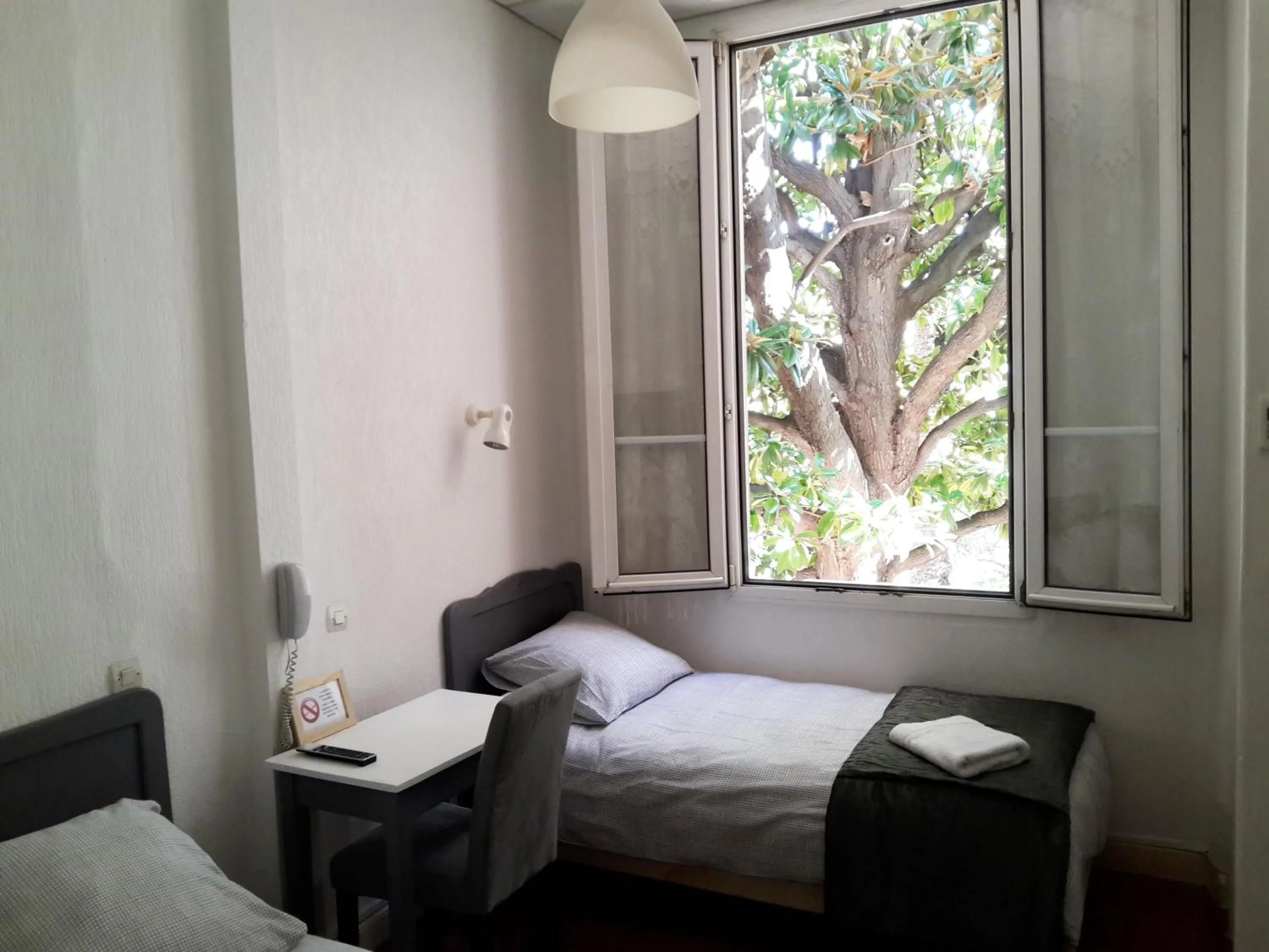 Bedroom in Hôtel Belle Meunière