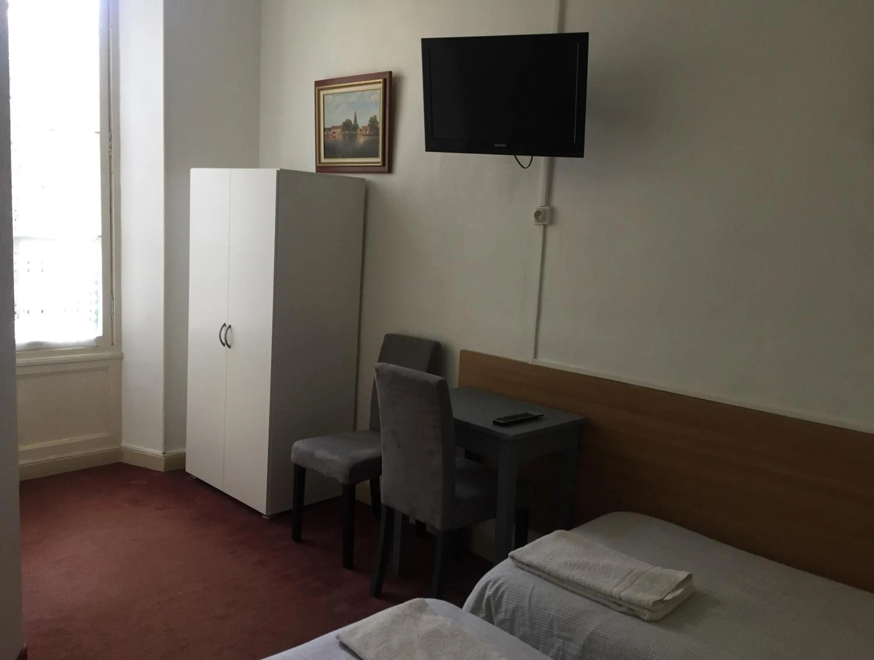 Bedroom in Hôtel Belle Meunière