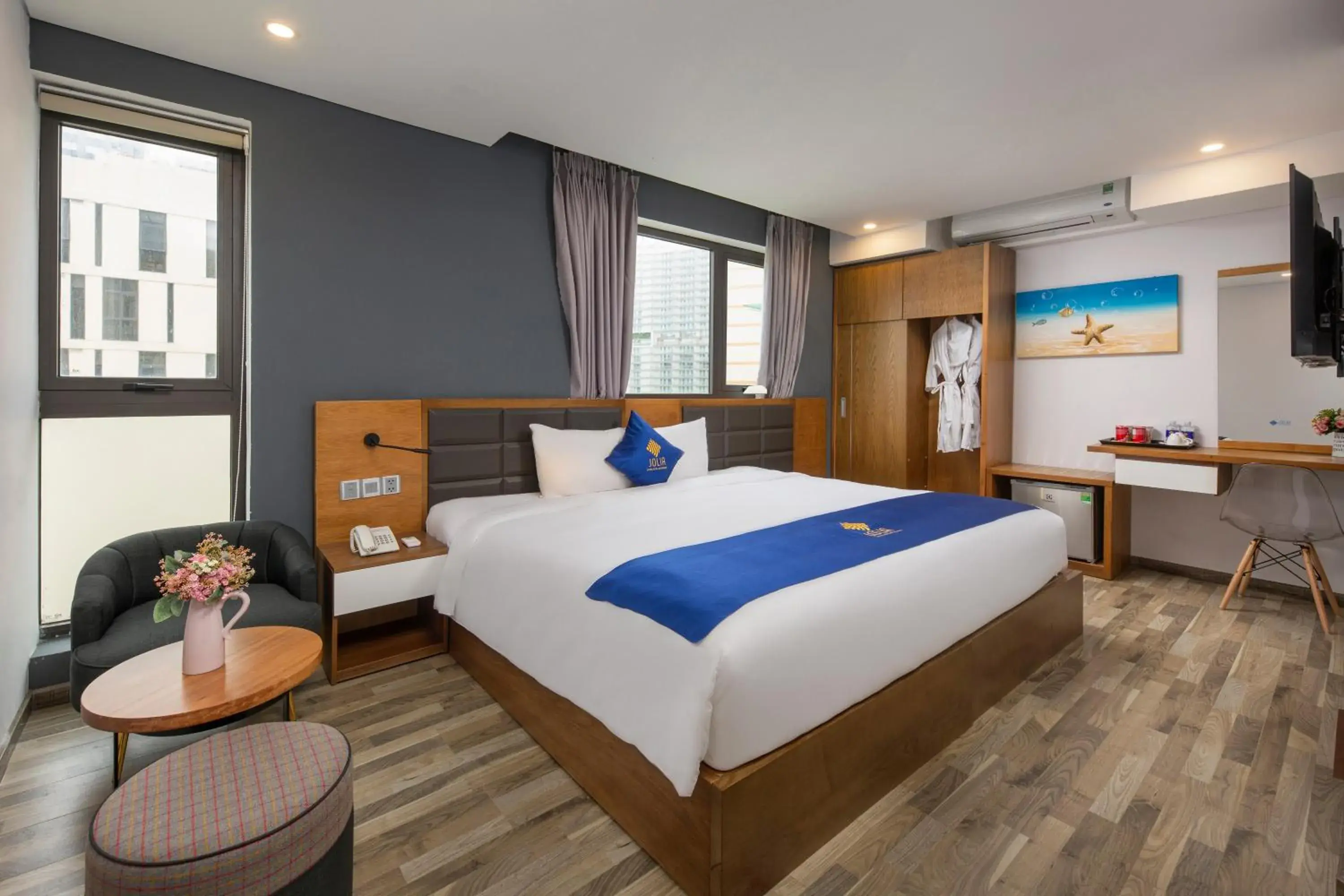 Family Room with Side Sea View in Jolia Hotel Danang Beach Family Room with Side Sea View in Jolia Hotel Danang Beach